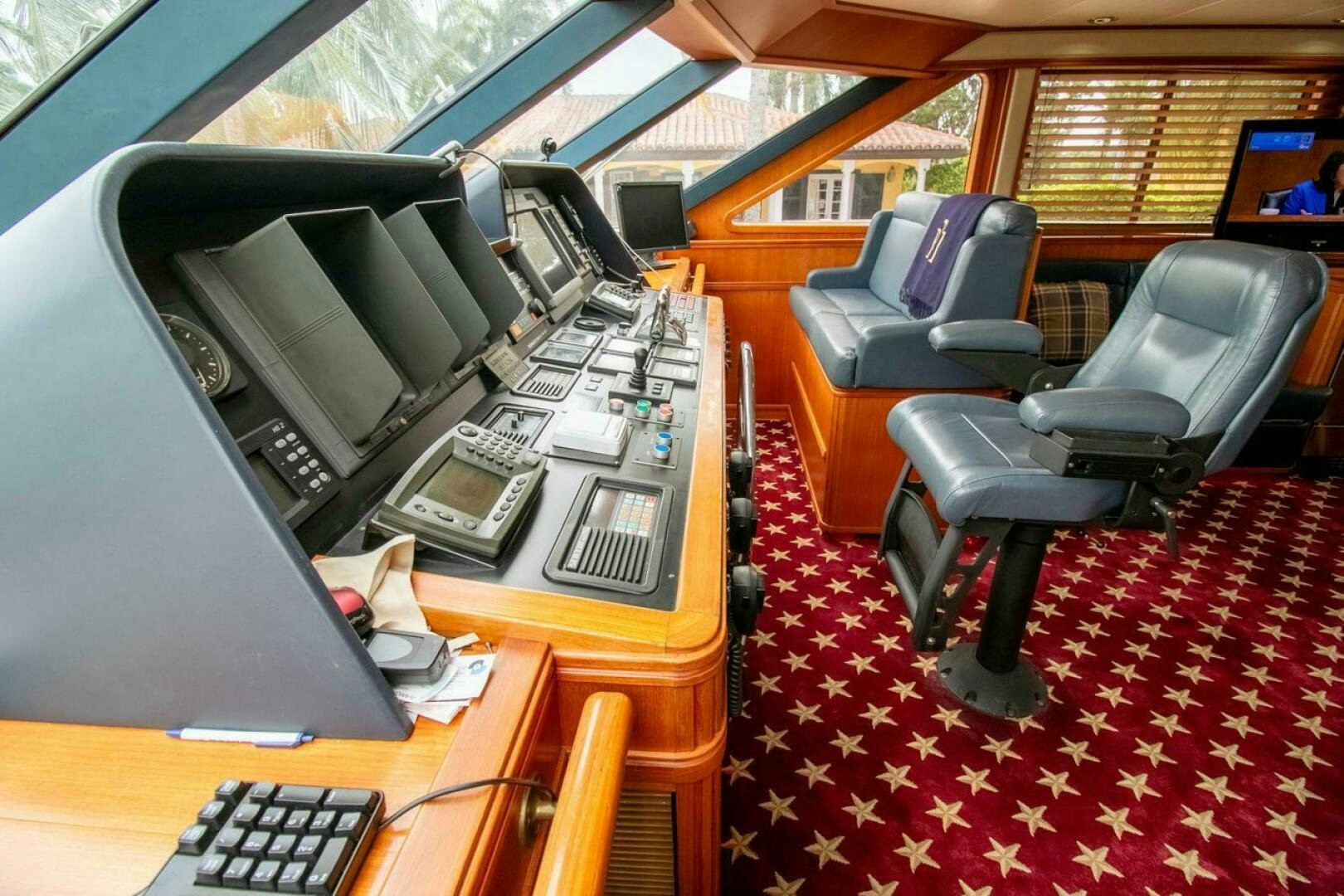 a desk with a computer and a chair aboard CHAIRMAN  Yacht for Sale