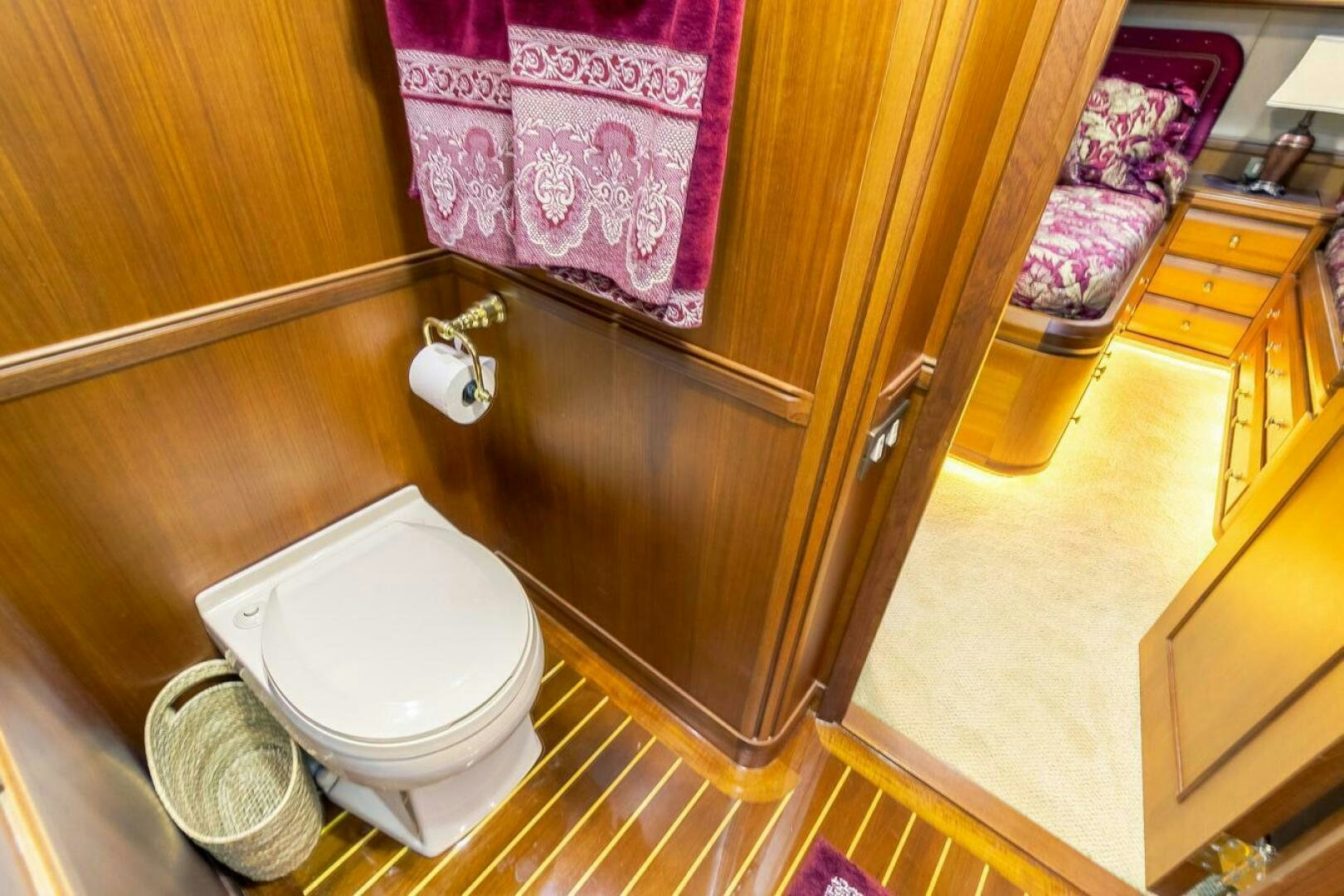 a toilet in a bathroom aboard CHAIRMAN  Yacht for Sale