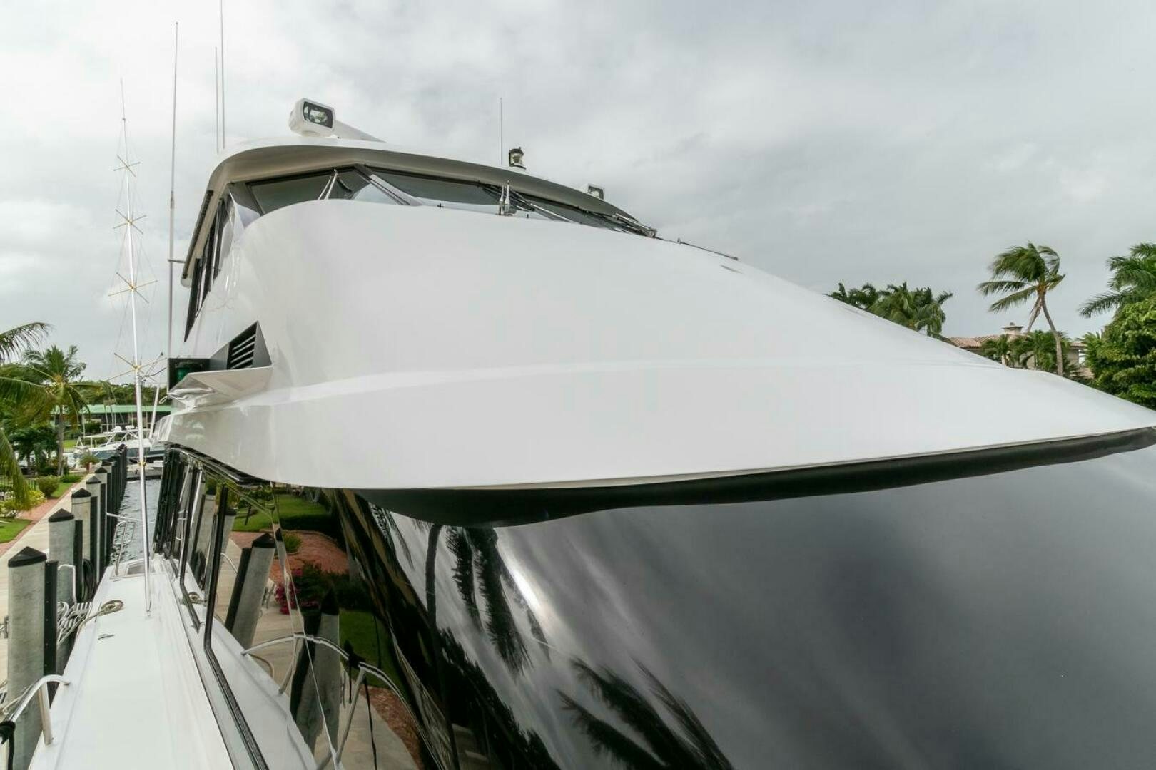 a white boat with a white roof aboard CHAIRMAN  Yacht for Sale