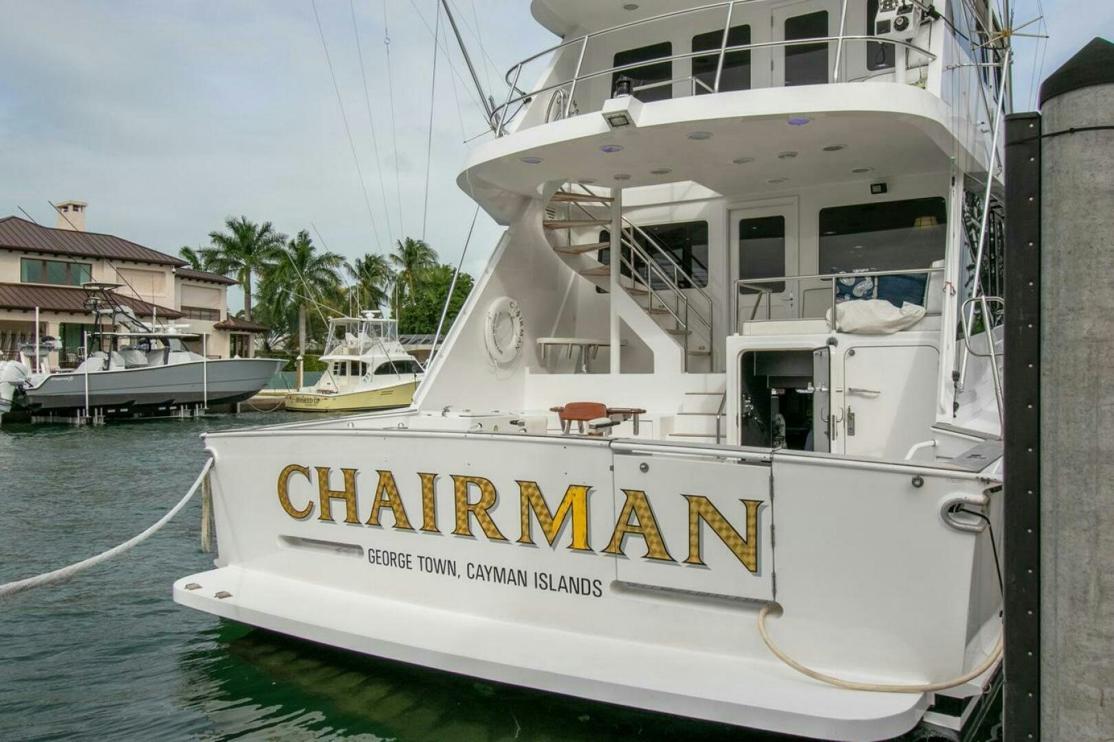a white boat on the water aboard CHAIRMAN  Yacht for Sale