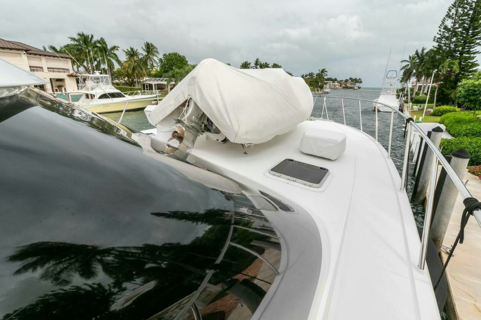 a boat with a cover on the front aboard CHAIRMAN  Yacht for Sale