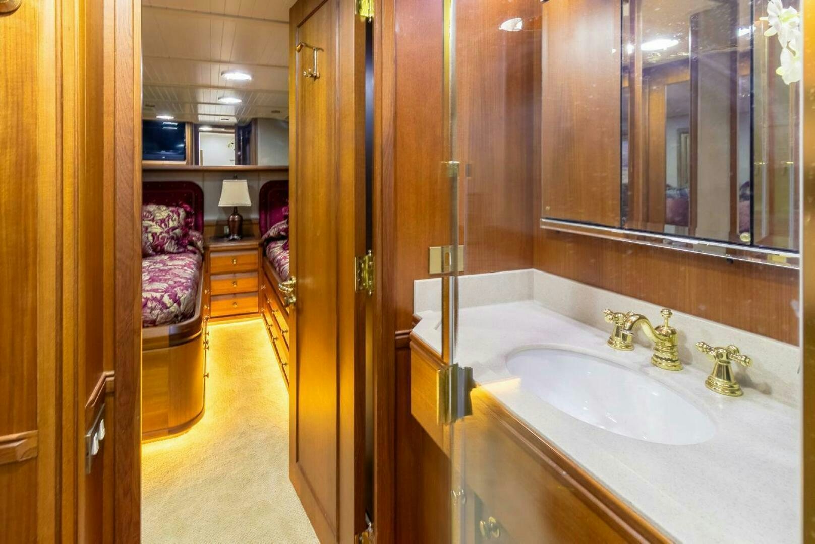 a bathroom with a bathtub and sink aboard CHAIRMAN  Yacht for Sale