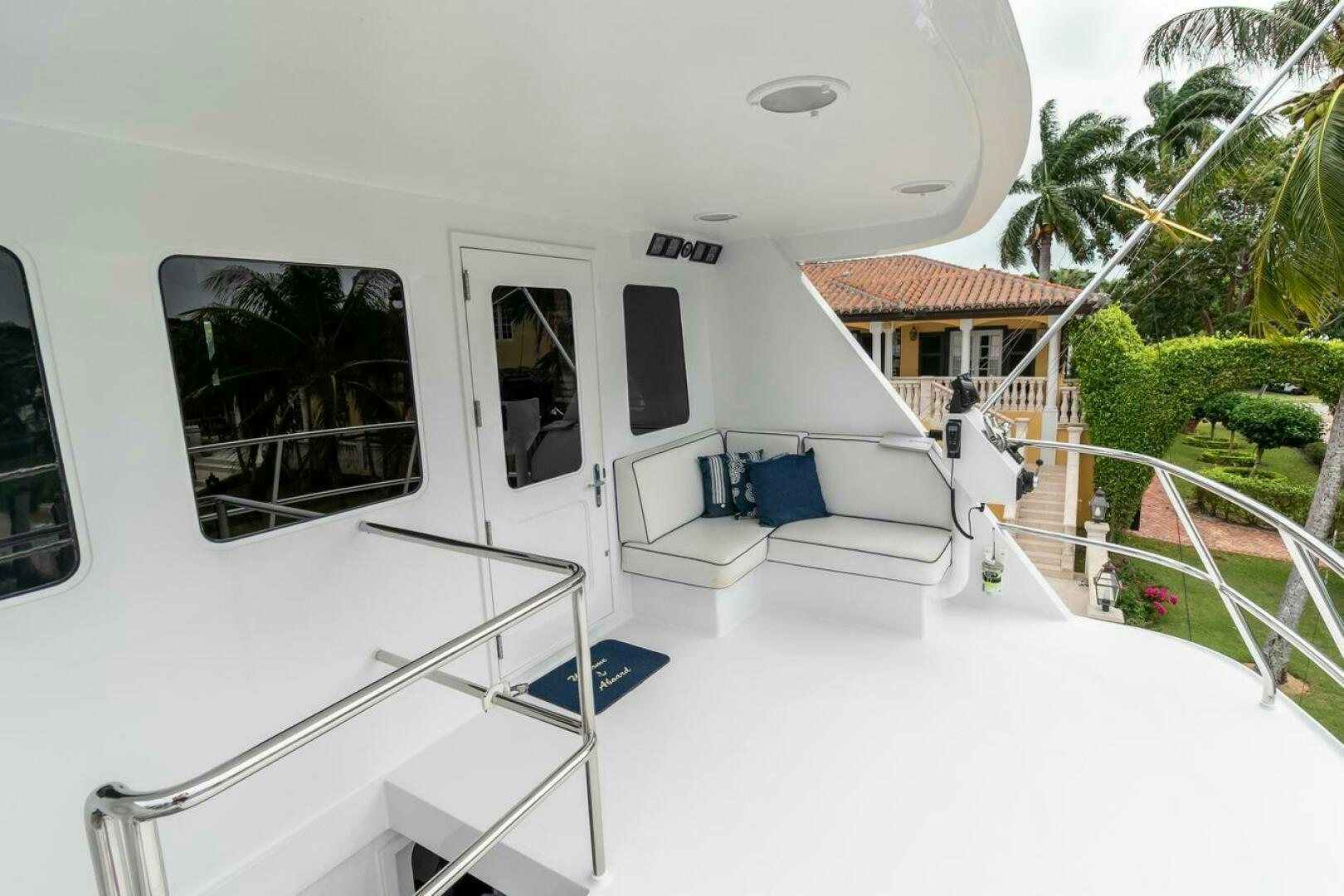 a white house with a white roof aboard CHAIRMAN  Yacht for Sale