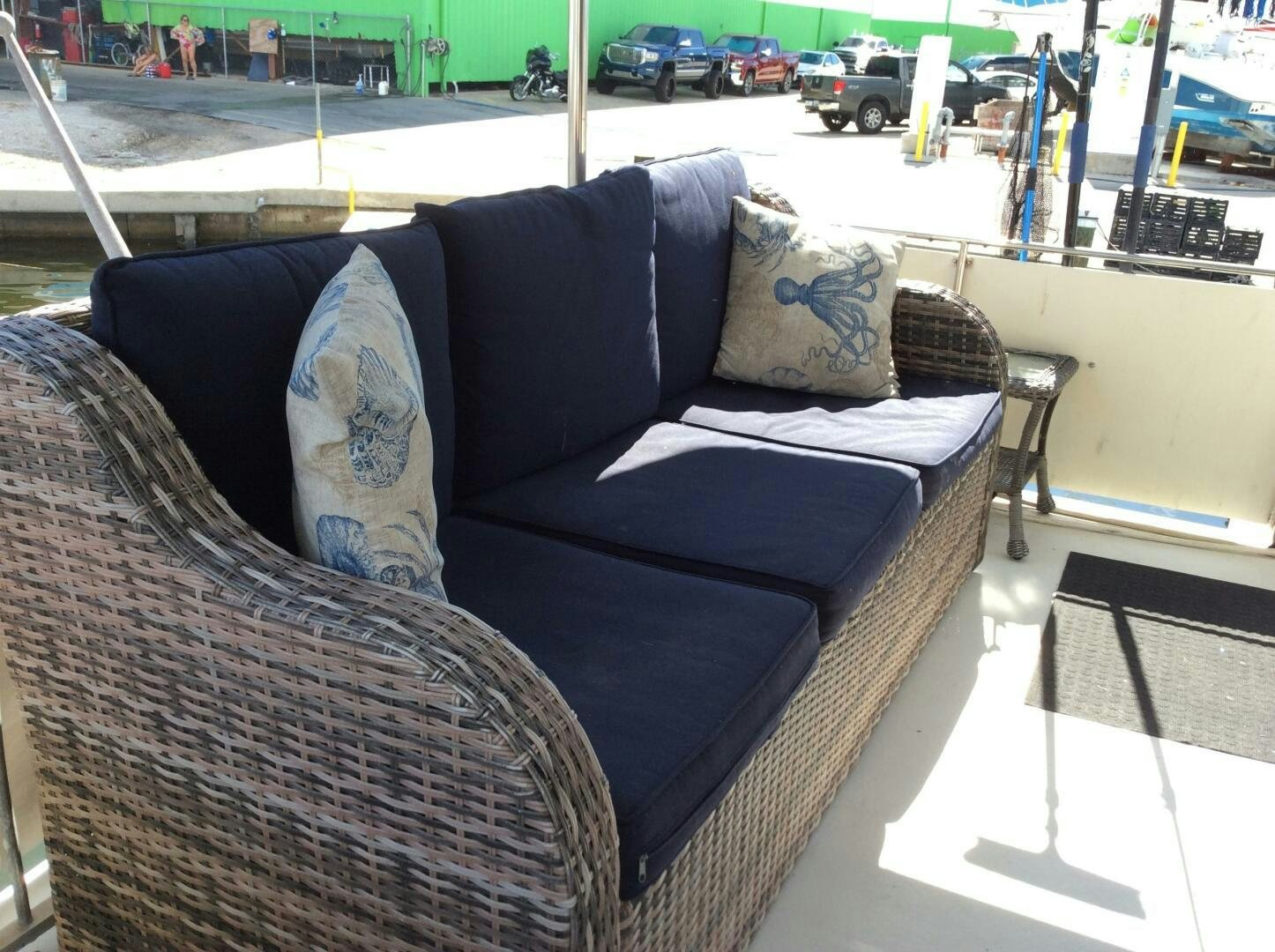a couch with pillows aboard TREES HOUSE Yacht for Sale