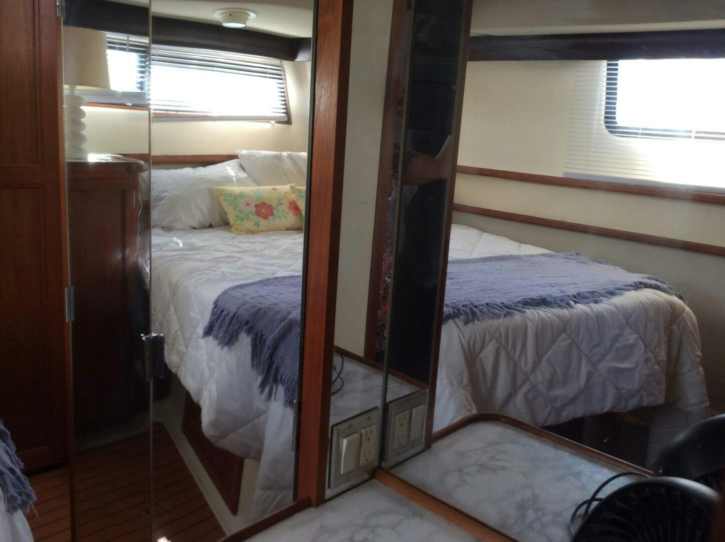 a bunk bed with a wood frame aboard TREES HOUSE Yacht for Sale