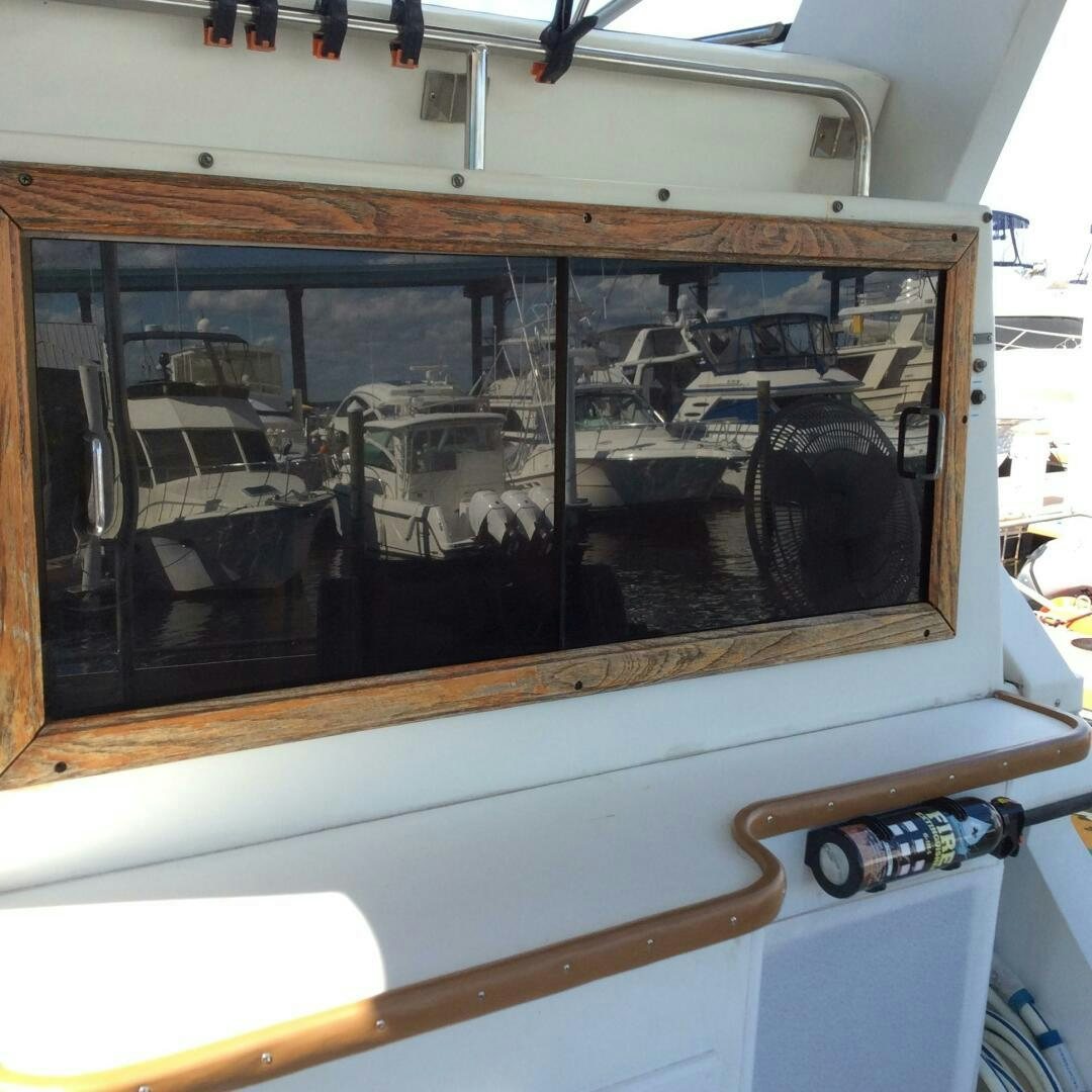 a window with a door open aboard TREES HOUSE Yacht for Sale