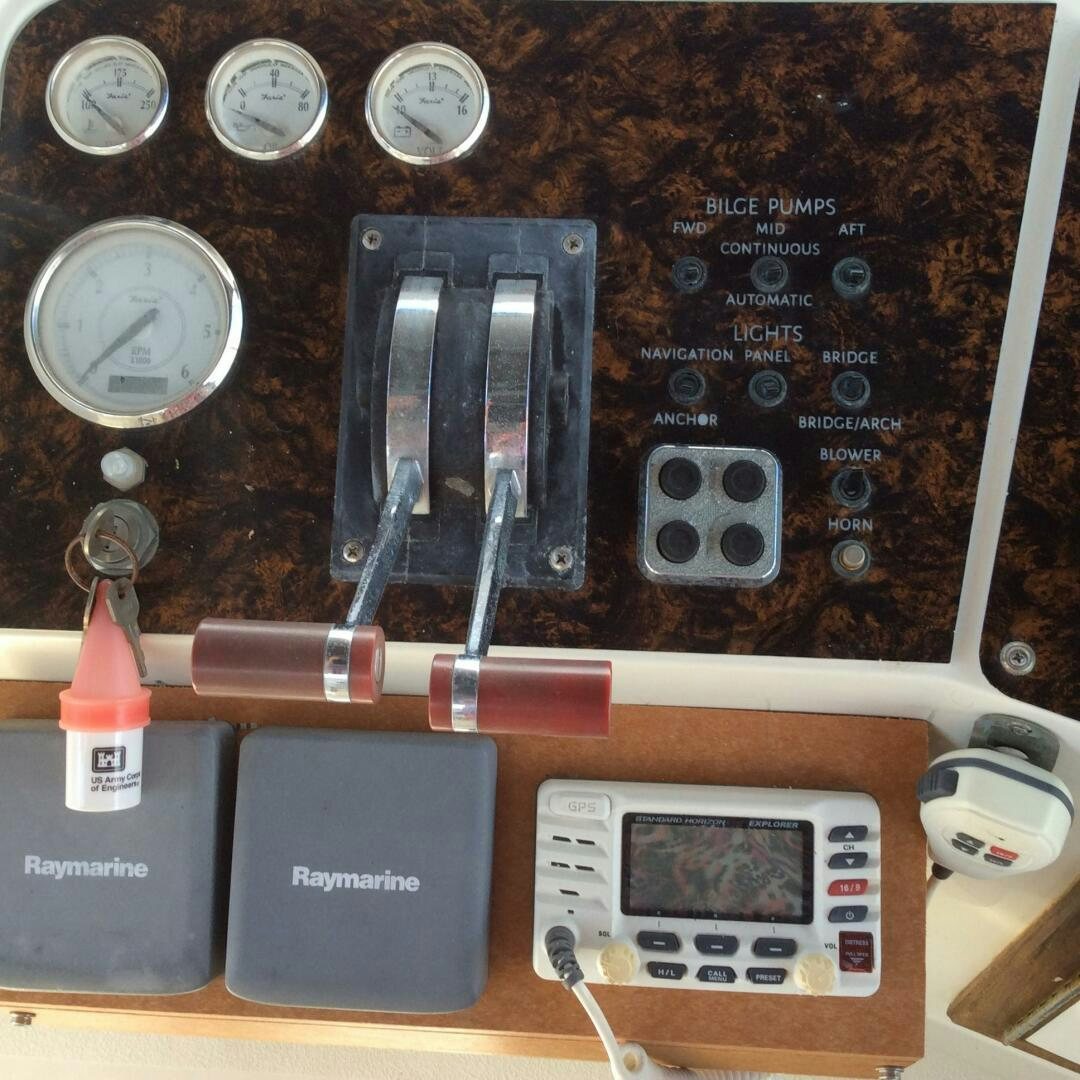 a close-up of a car stereo aboard TREES HOUSE Yacht for Sale