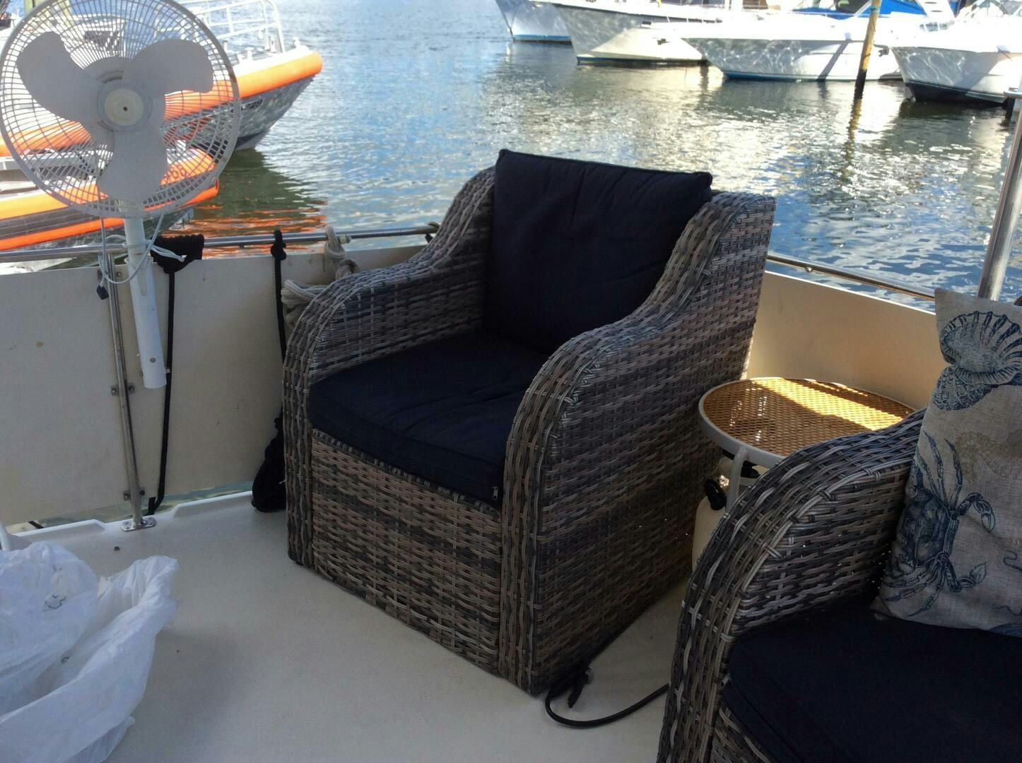 a chair on a boat aboard TREES HOUSE Yacht for Sale
