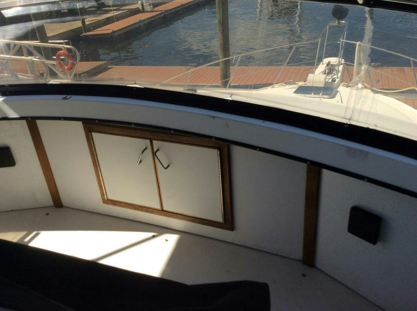 a window with a view of a street and a street aboard TREES HOUSE Yacht for Sale