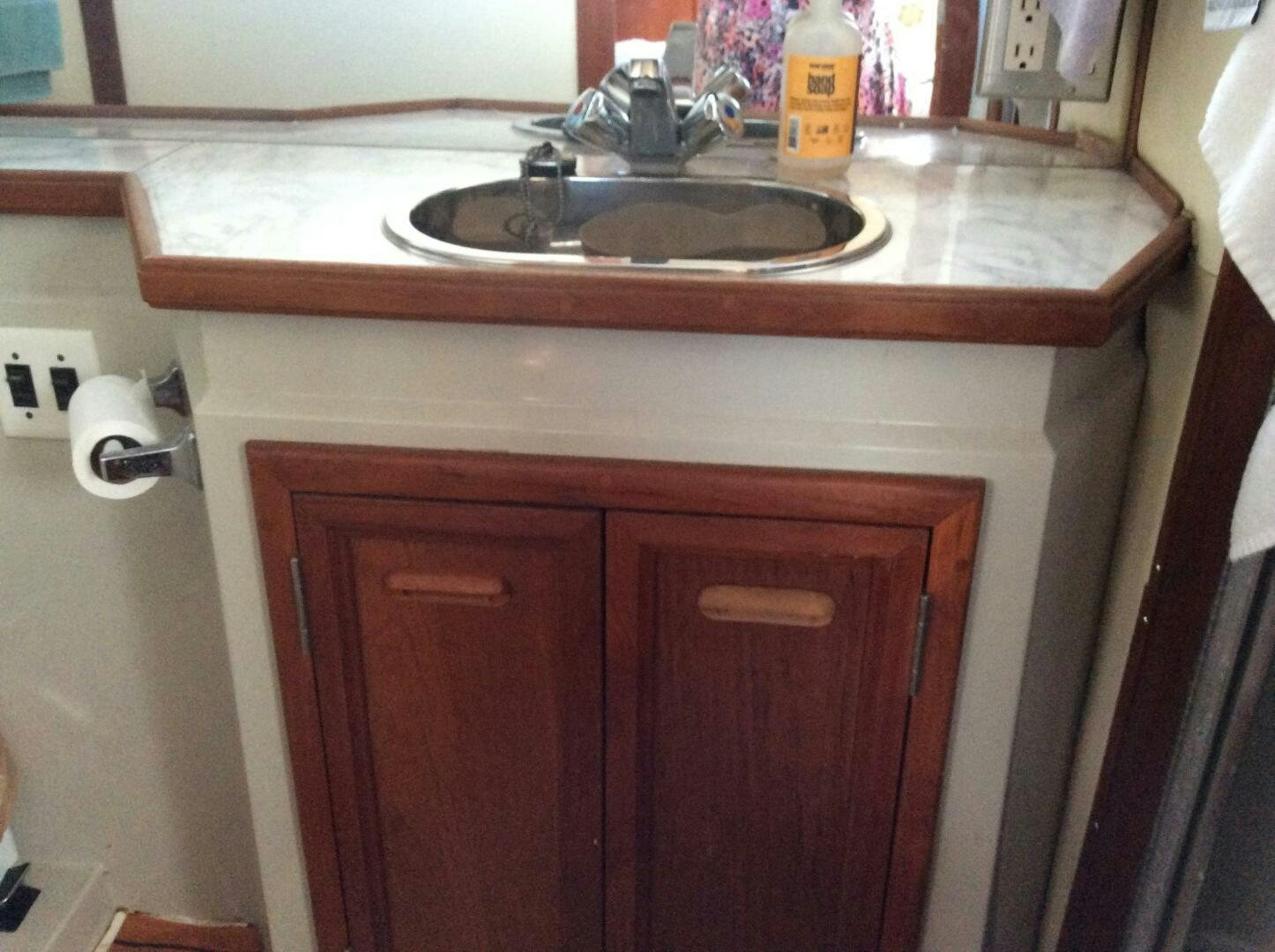 a sink with a faucet aboard TREES HOUSE Yacht for Sale