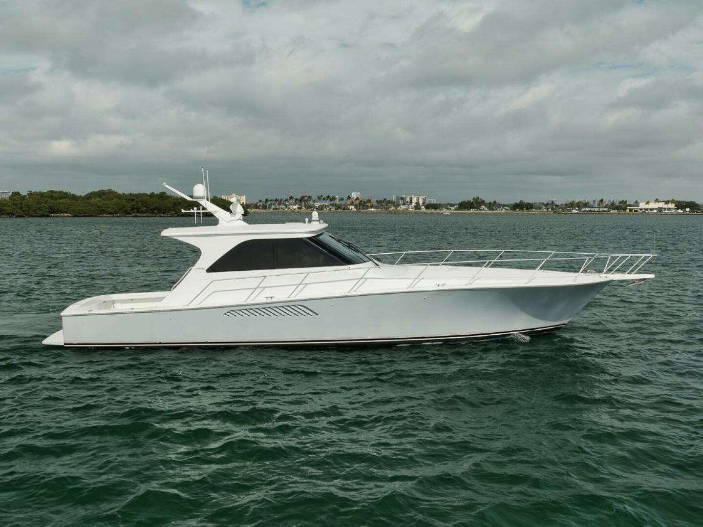 a white boat in the water aboard SMOOTH OPERATOR Yacht for Sale