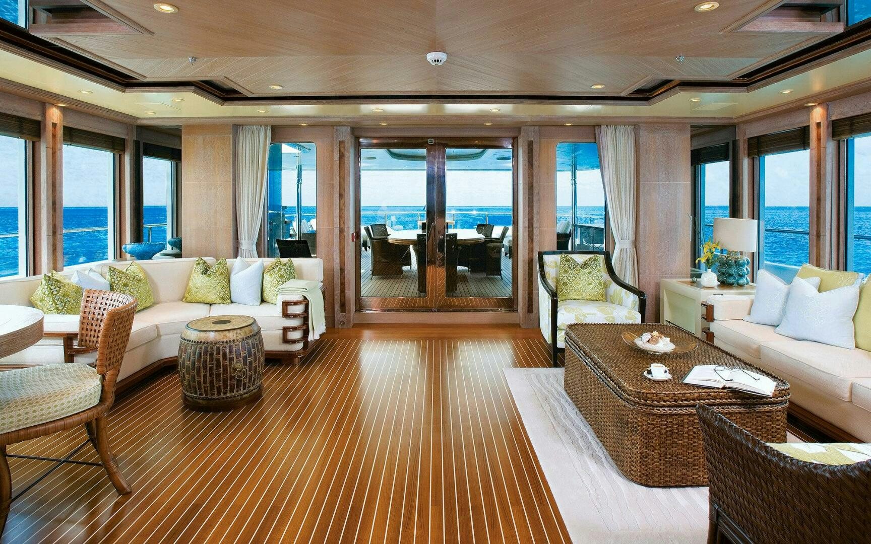 a living room with a large open door aboard PERLE BLEUE Yacht for Sale