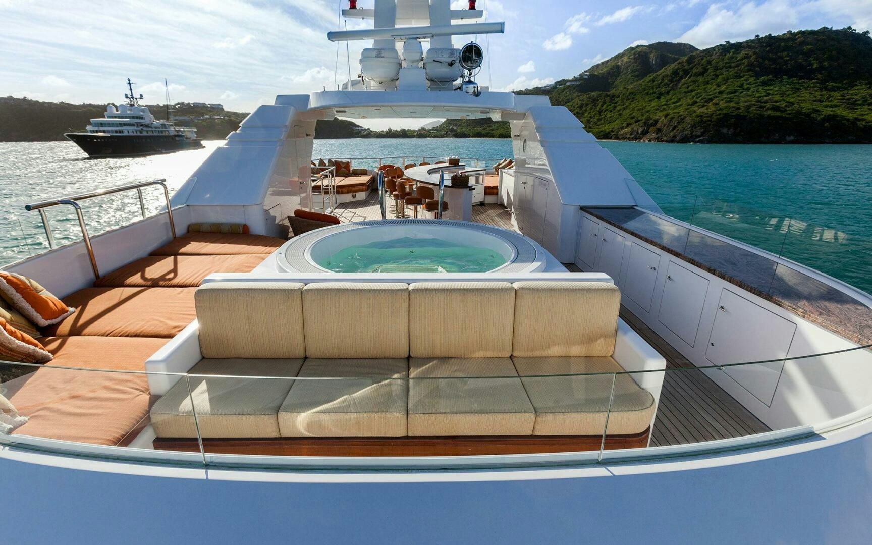 a boat on the water aboard PERLE BLEUE Yacht for Sale
