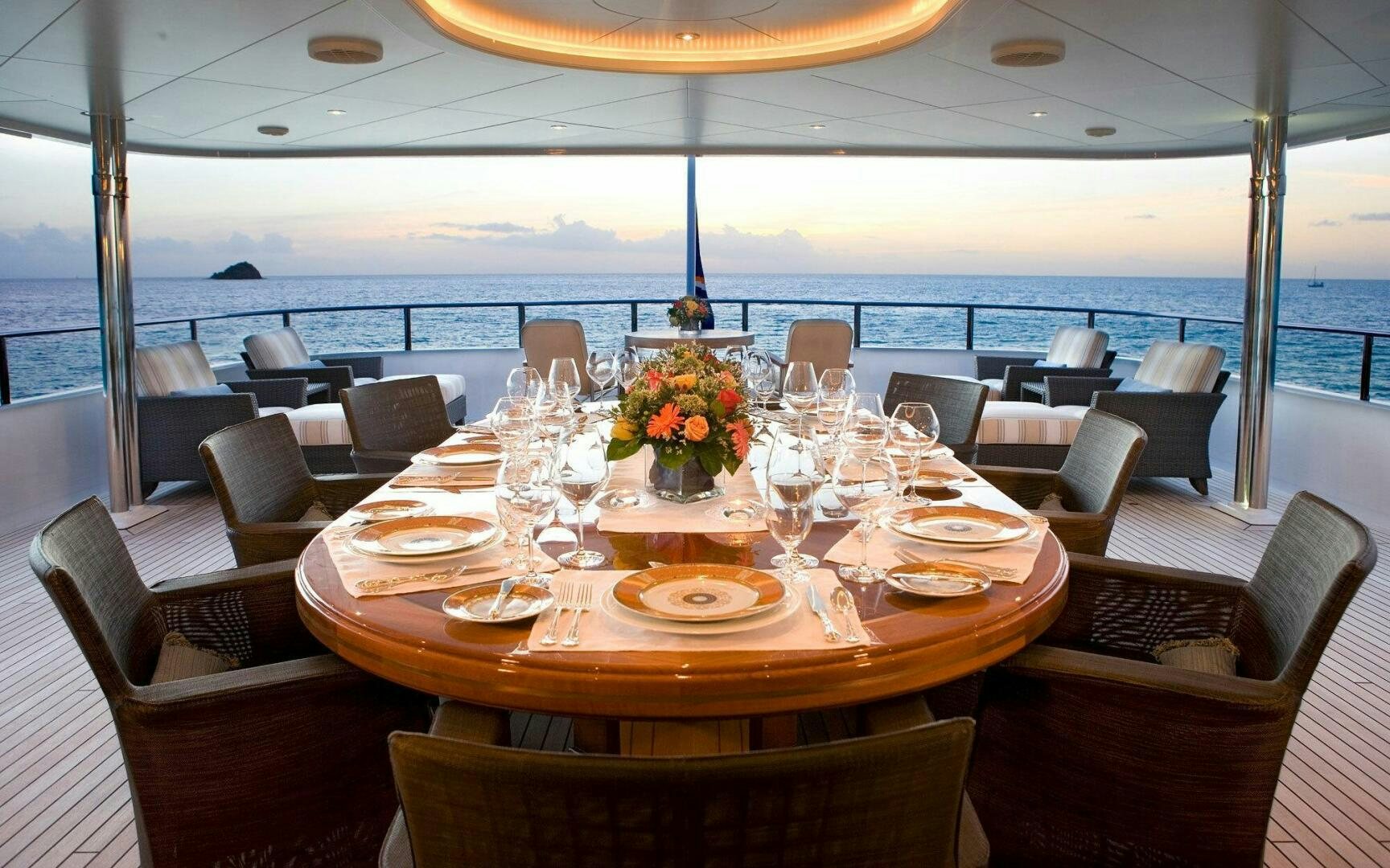 a table set for a meal aboard PERLE BLEUE Yacht for Sale
