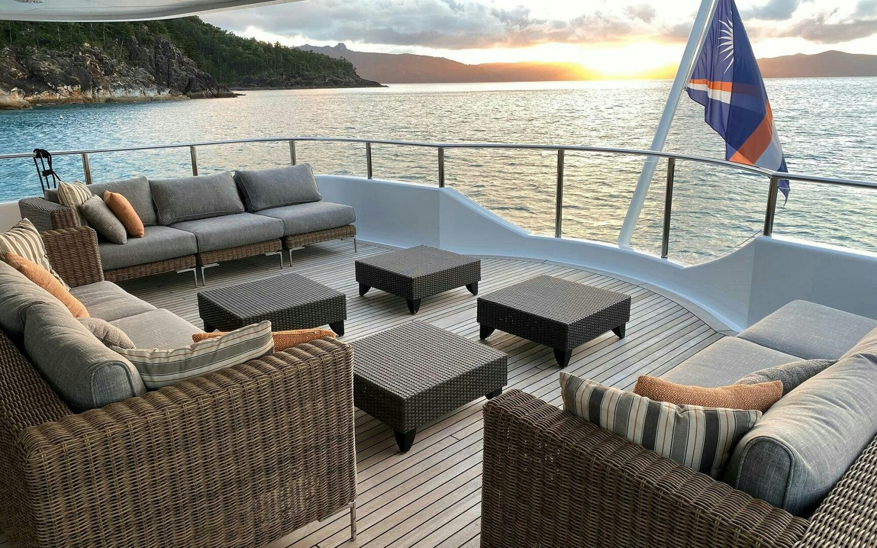 a deck with a couch and a chair on it aboard PERLE BLEUE Yacht for Sale