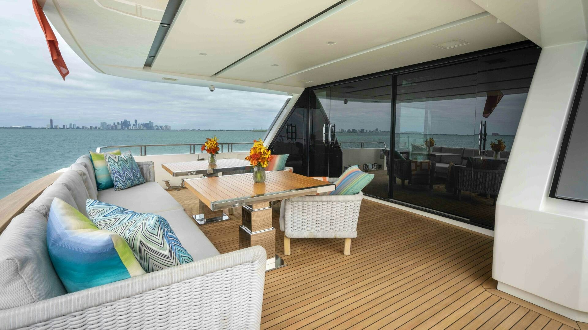 a room with a table and chairs aboard HONEY POT Yacht for Sale