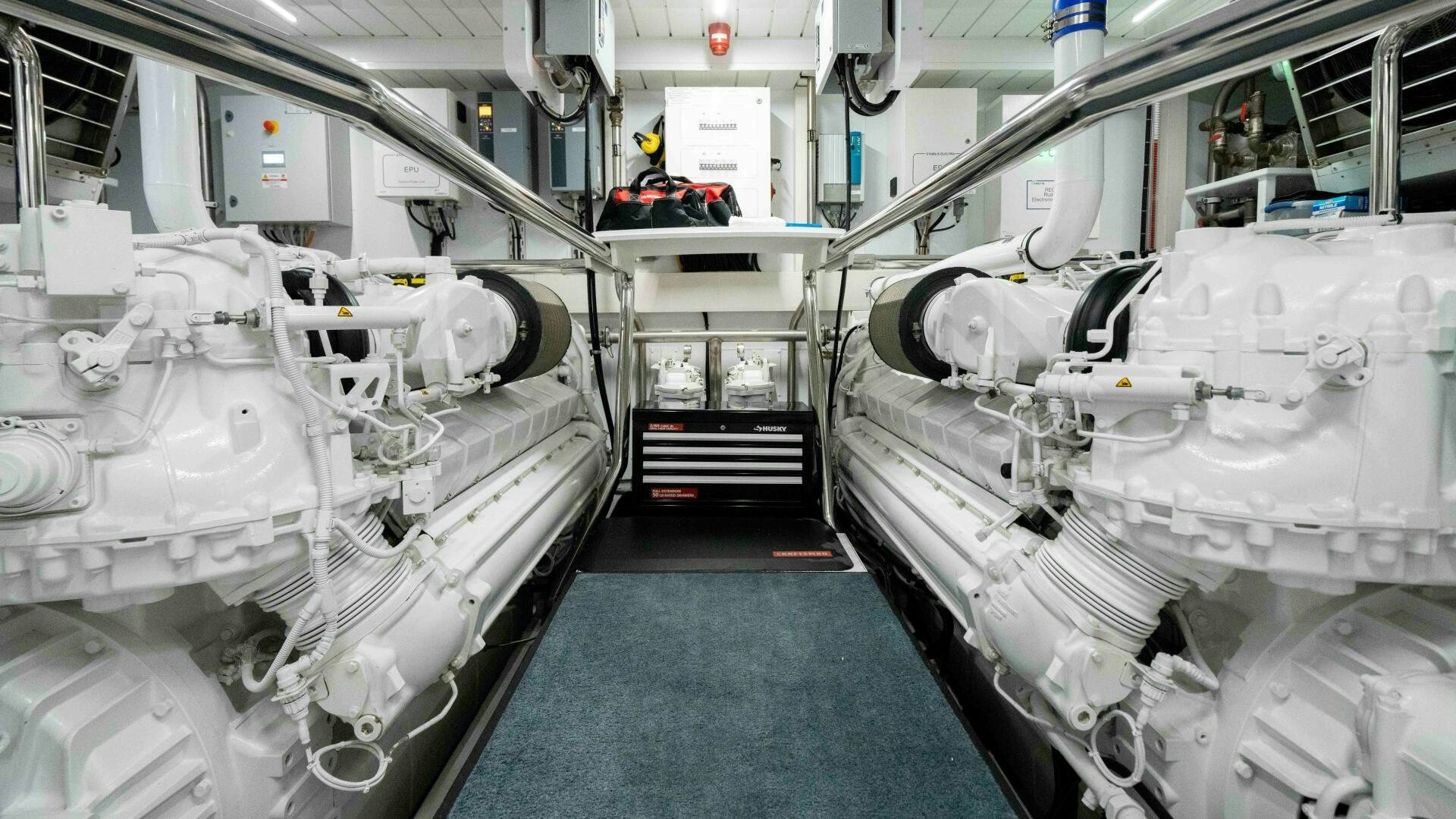 a room with white machines aboard HONEY POT Yacht for Sale