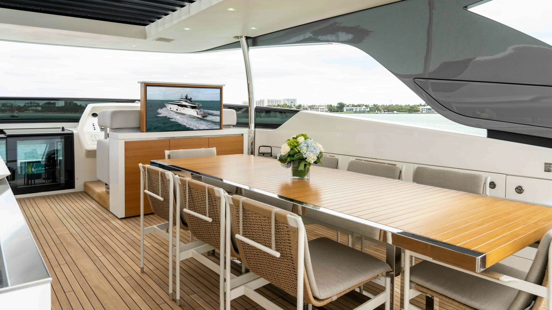 a room with a table and chairs aboard HONEY POT Yacht for Sale