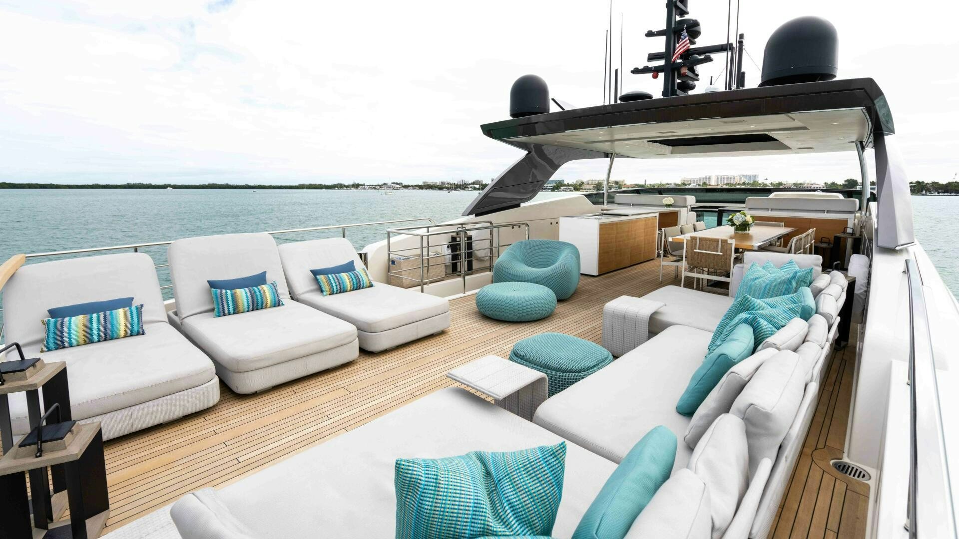 a large white boat on a large body of water aboard HONEY POT Yacht for Sale