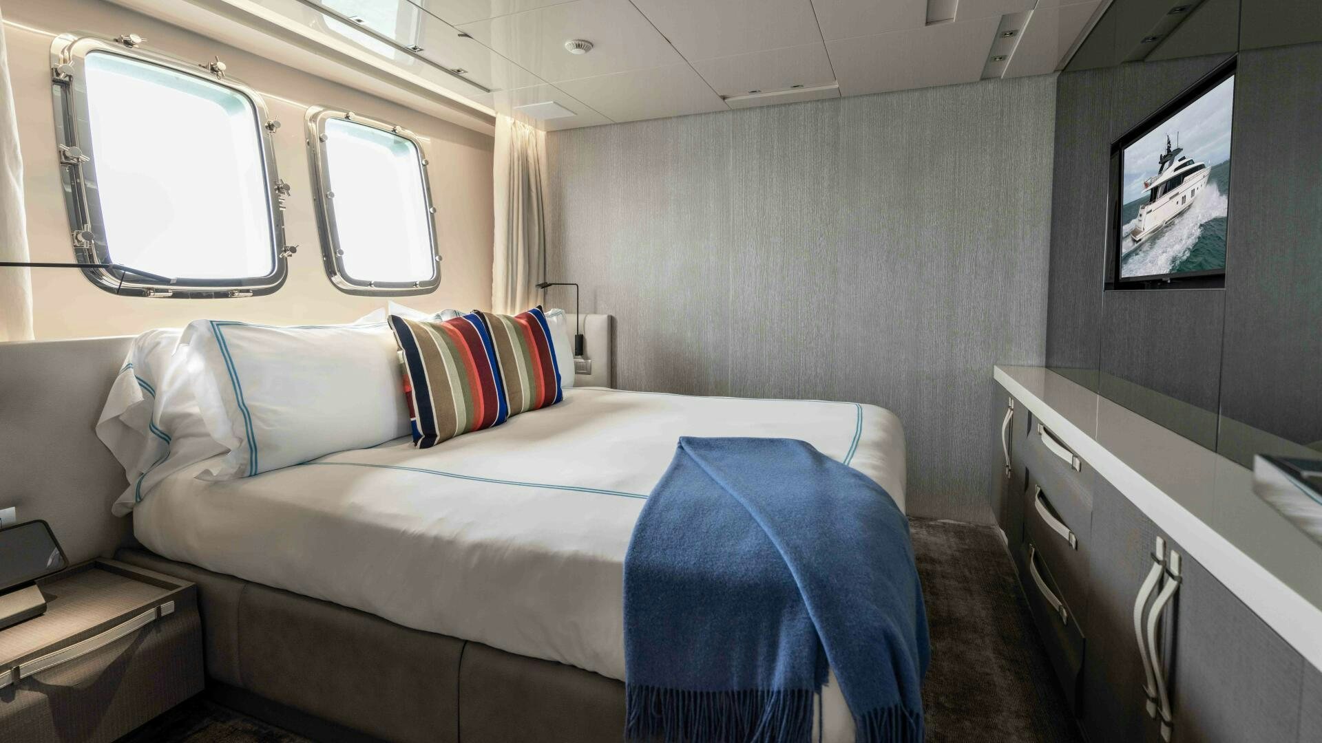 a bed in a room aboard HONEY POT Yacht for Sale