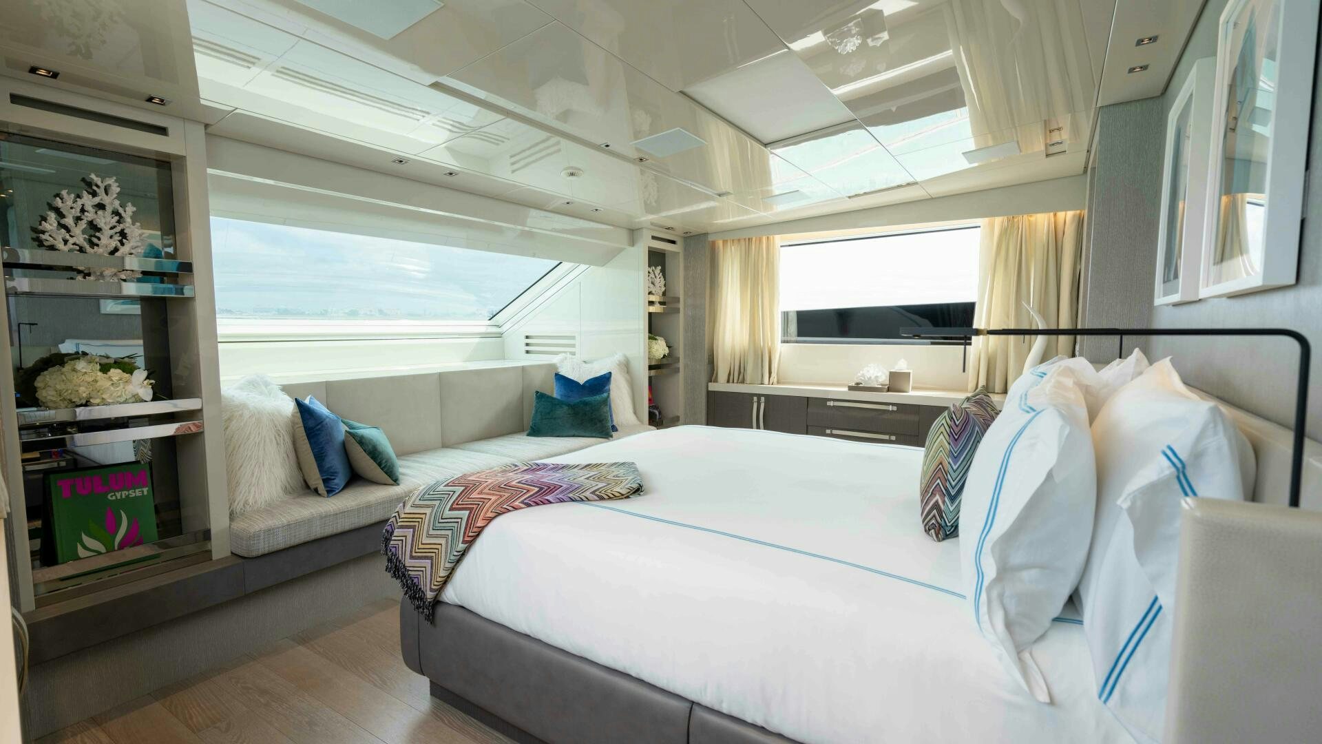 a room with a bed and a window aboard HONEY POT Yacht for Sale