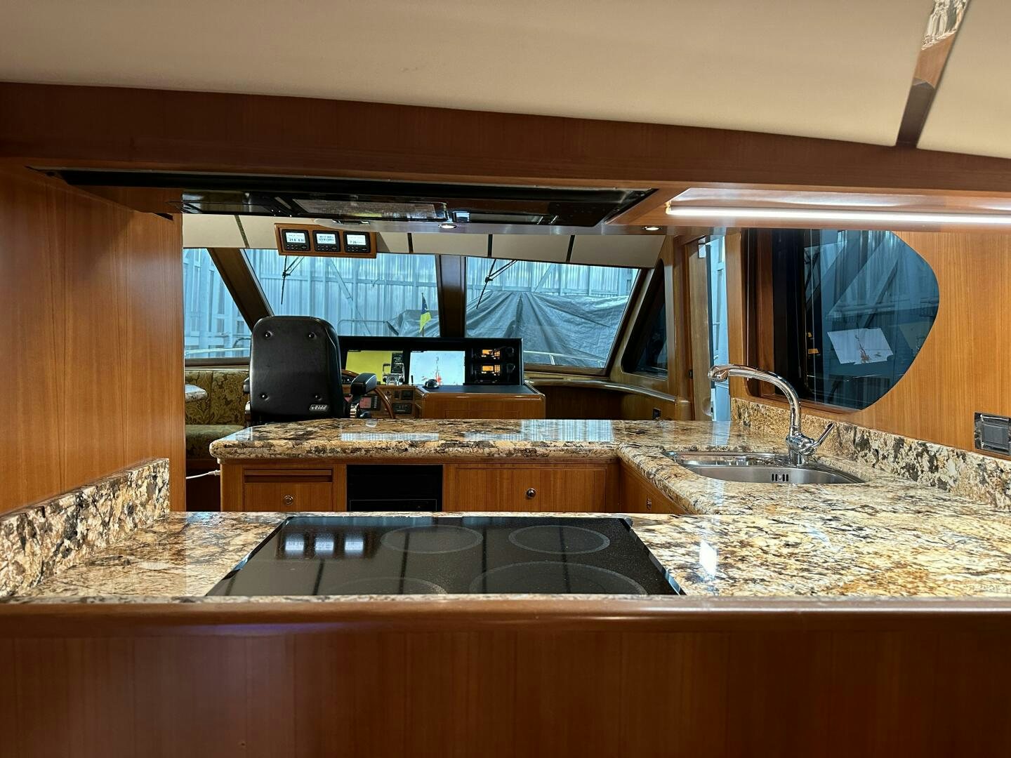 a kitchen with a sink and a microwave aboard ALL ABORDEAUX Yacht for Sale