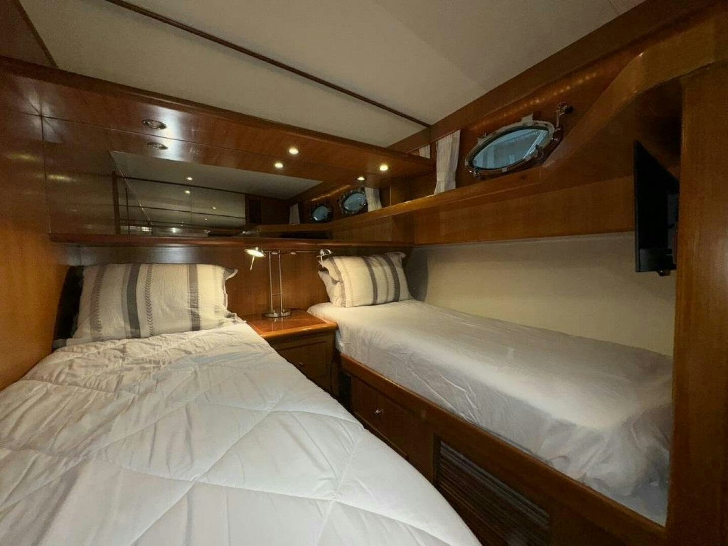 a room with two beds aboard ALL ABORDEAUX Yacht for Sale