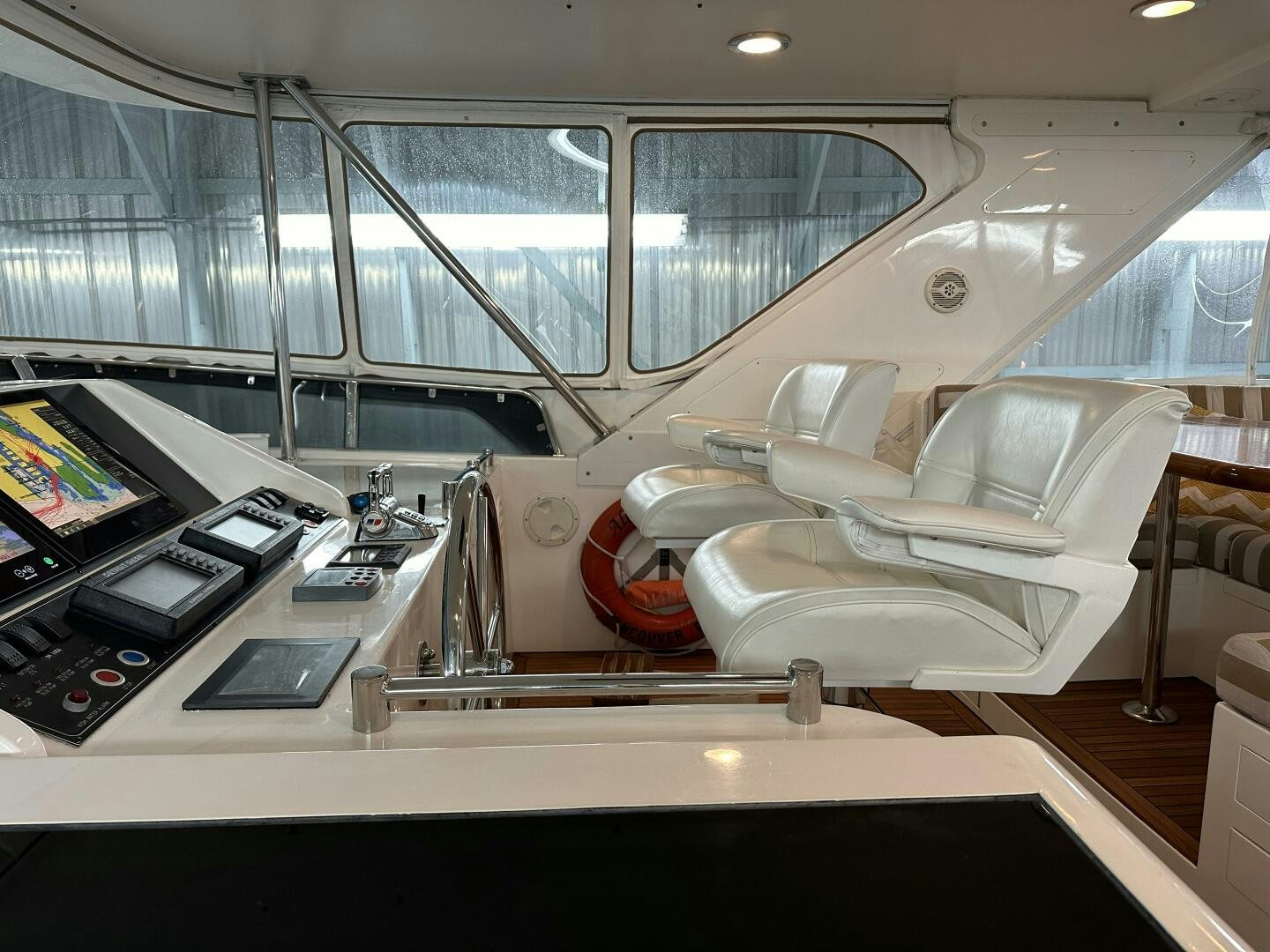 a room with a bed and a desk aboard ALL ABORDEAUX Yacht for Sale