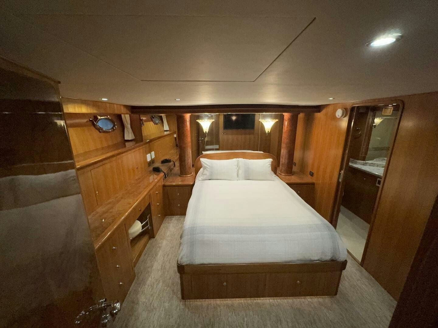 a bed in a room aboard ALL ABORDEAUX Yacht for Sale