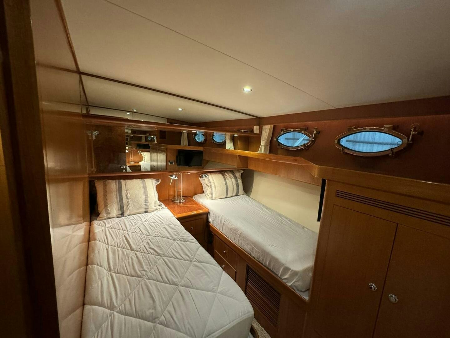 a room with two beds aboard ALL ABORDEAUX Yacht for Sale