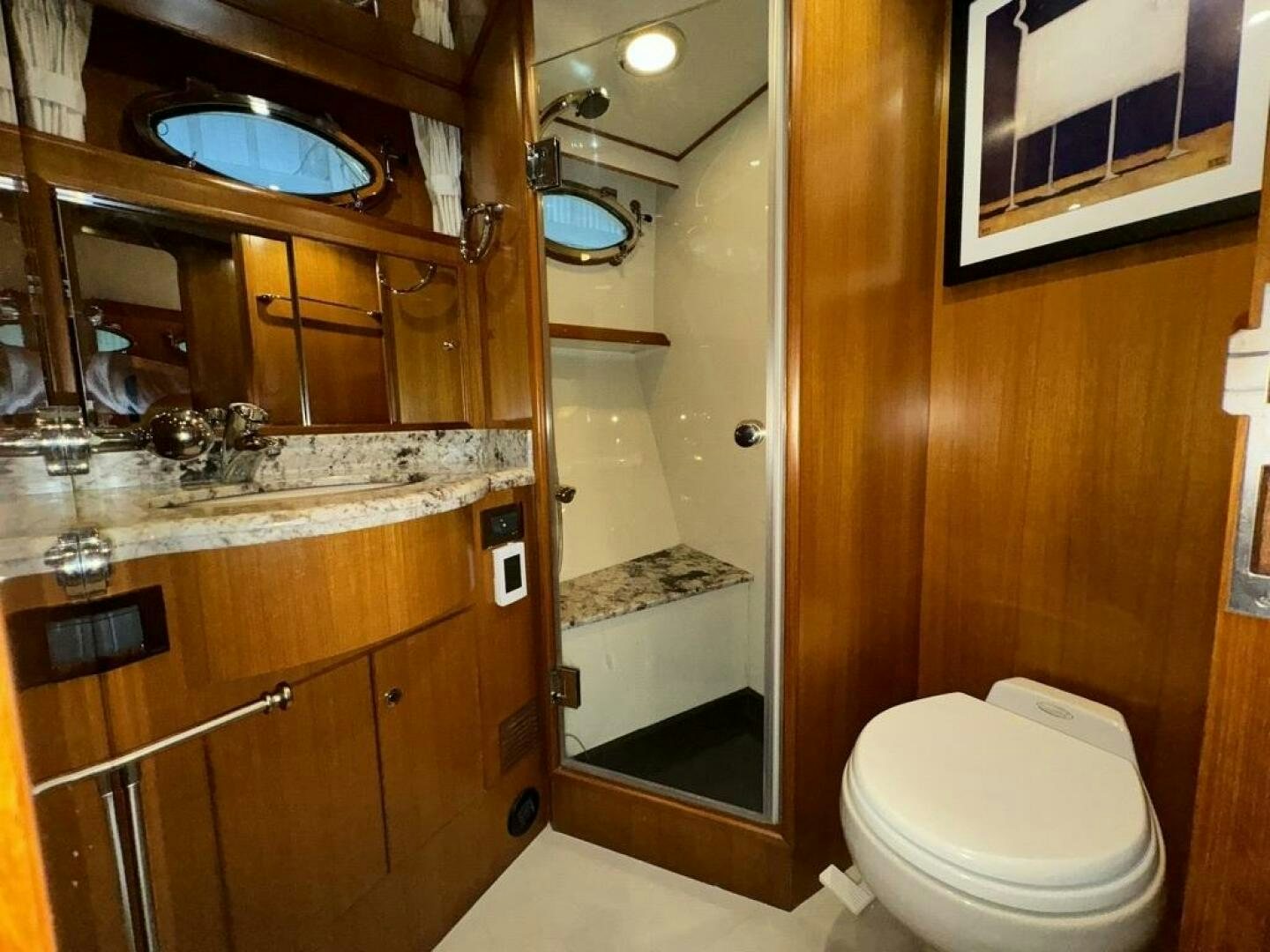 a bathroom with a toilet and a sink aboard ALL ABORDEAUX Yacht for Sale