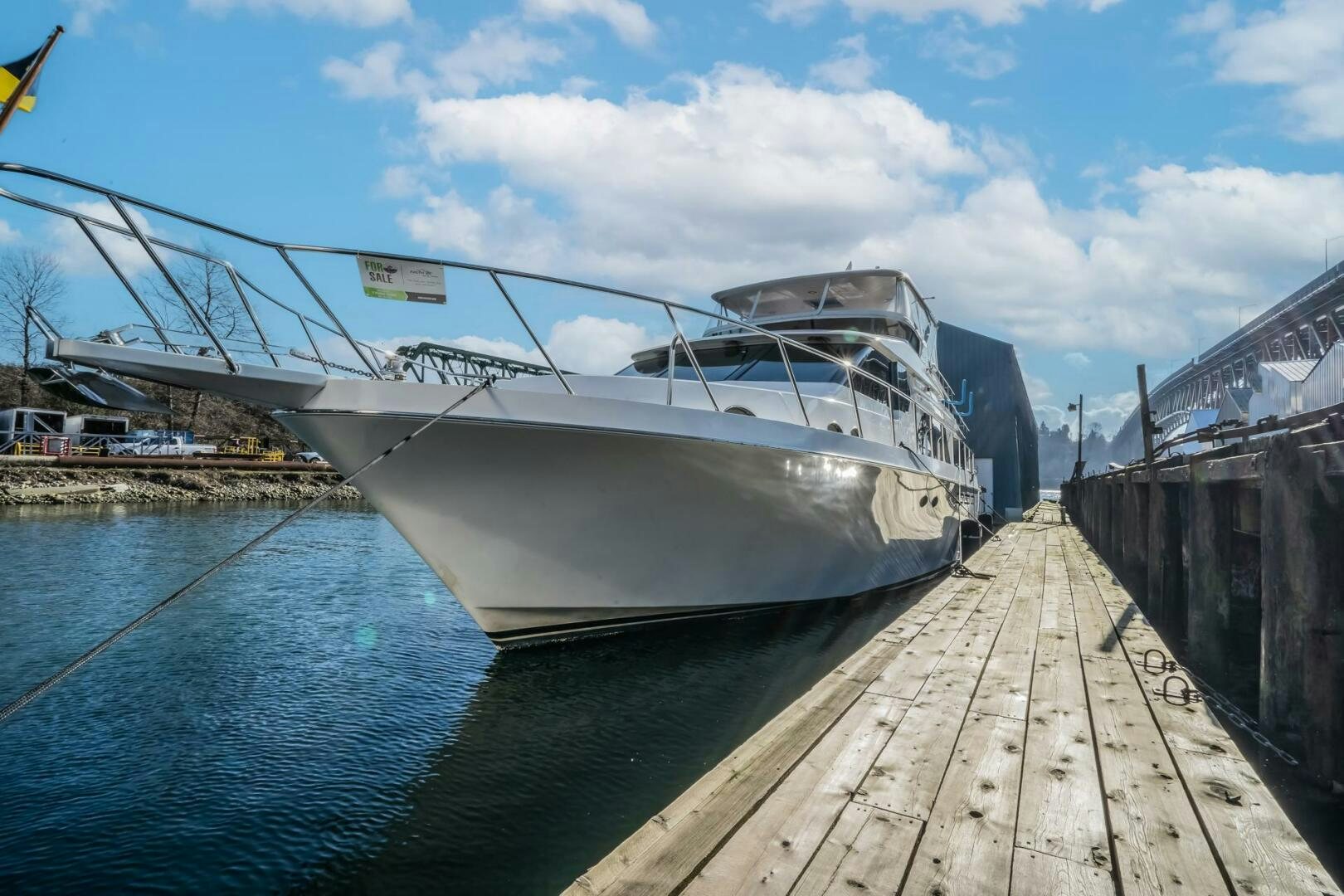 a boat docked at a pier aboard ALL ABORDEAUX Yacht for Sale