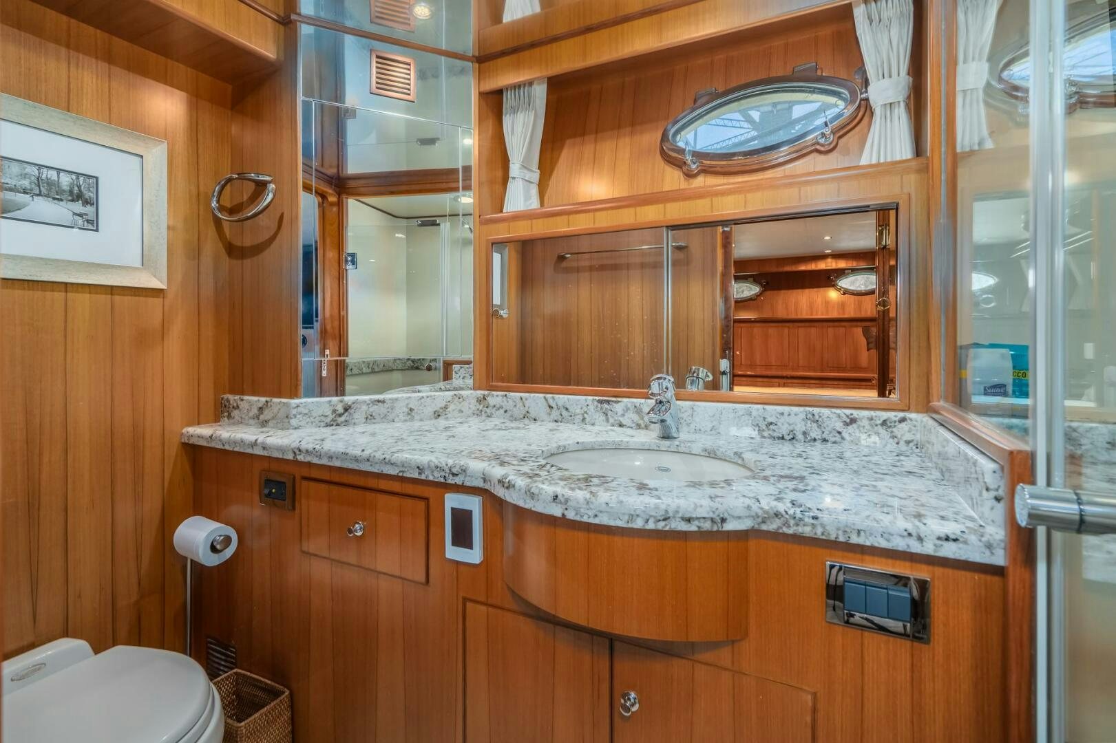 a bathroom with a large marble counter top aboard ALL ABORDEAUX Yacht for Sale