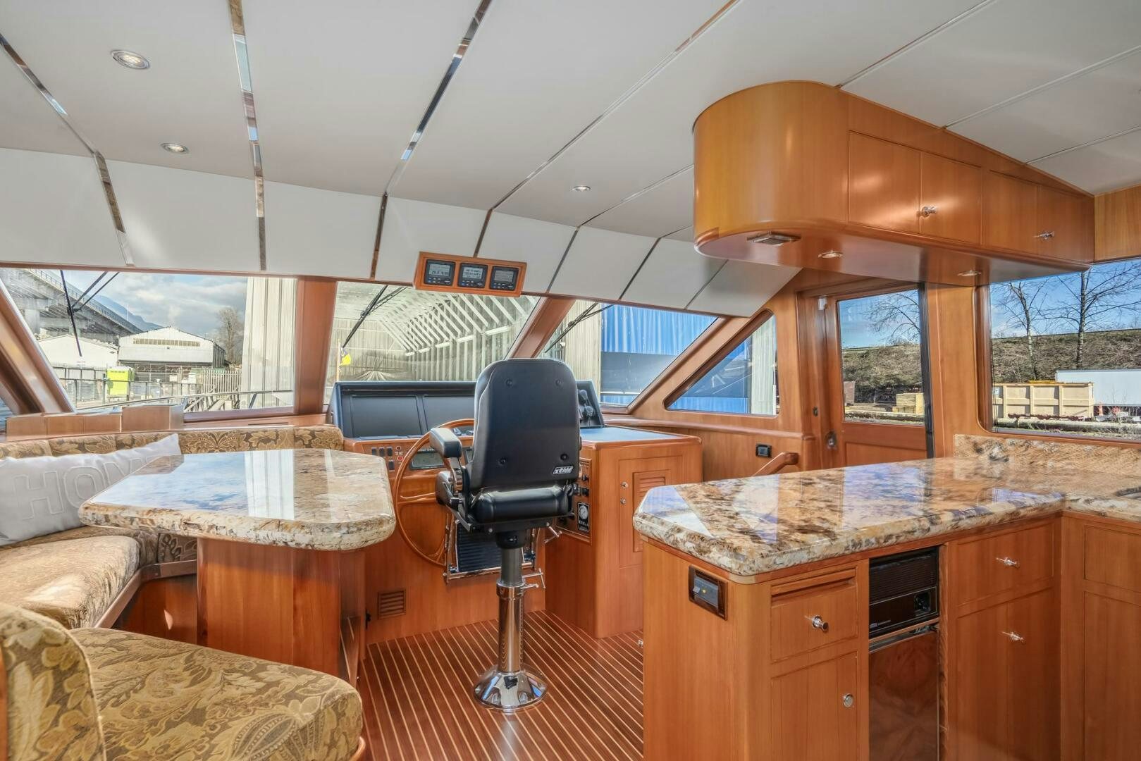 a kitchen with a bar and a bar aboard ALL ABORDEAUX Yacht for Sale