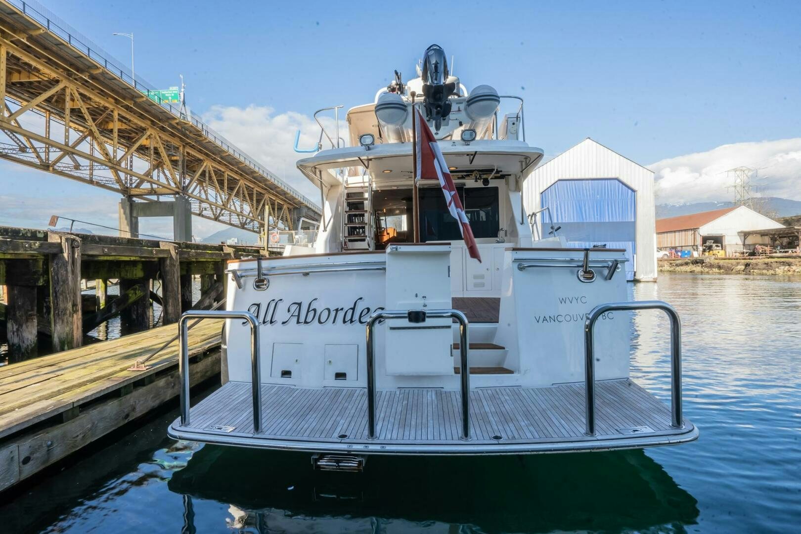 a boat docked at a pier aboard ALL ABORDEAUX Yacht for Sale