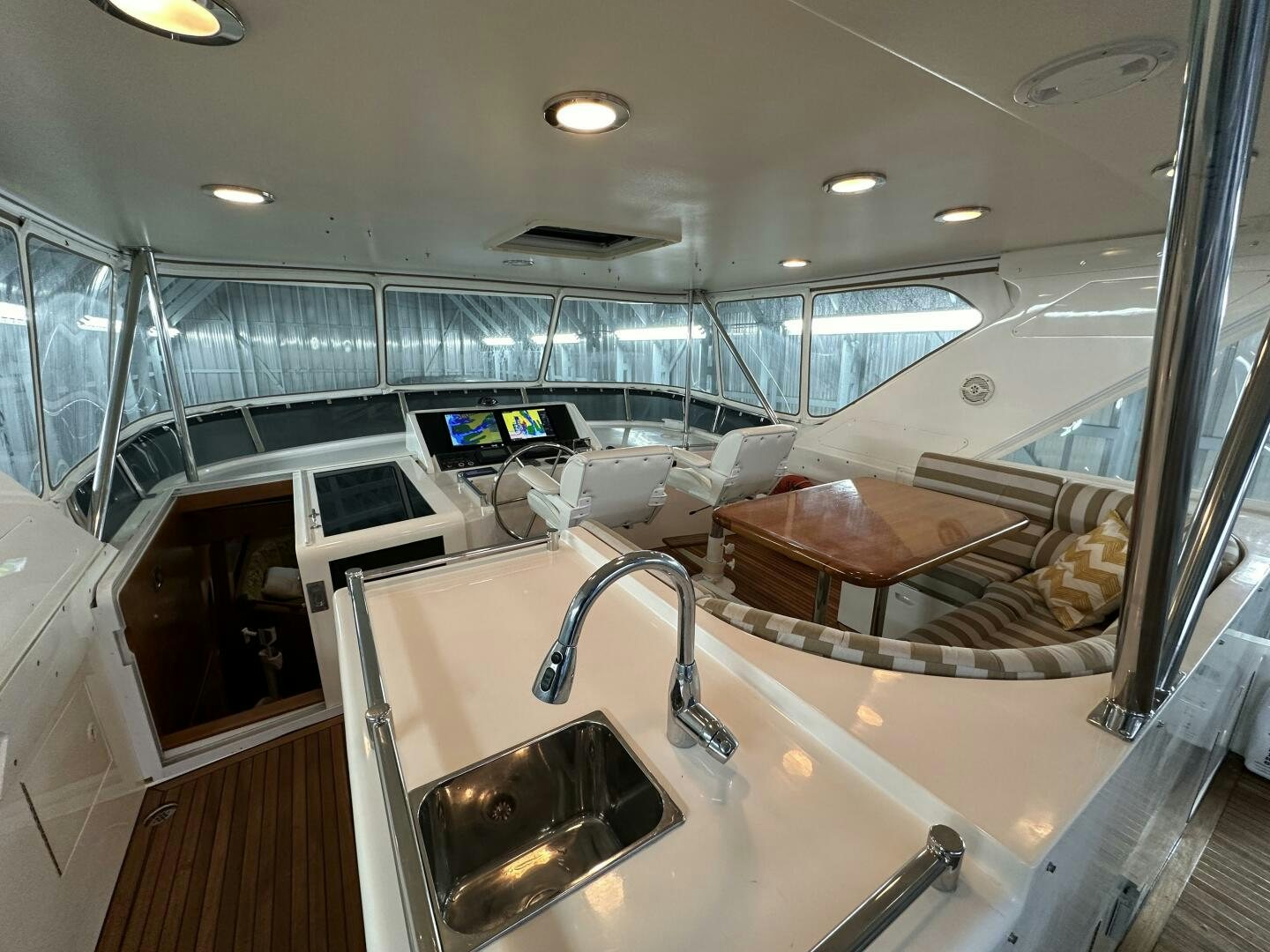 a large bathroom with a large mirror aboard ALL ABORDEAUX Yacht for Sale