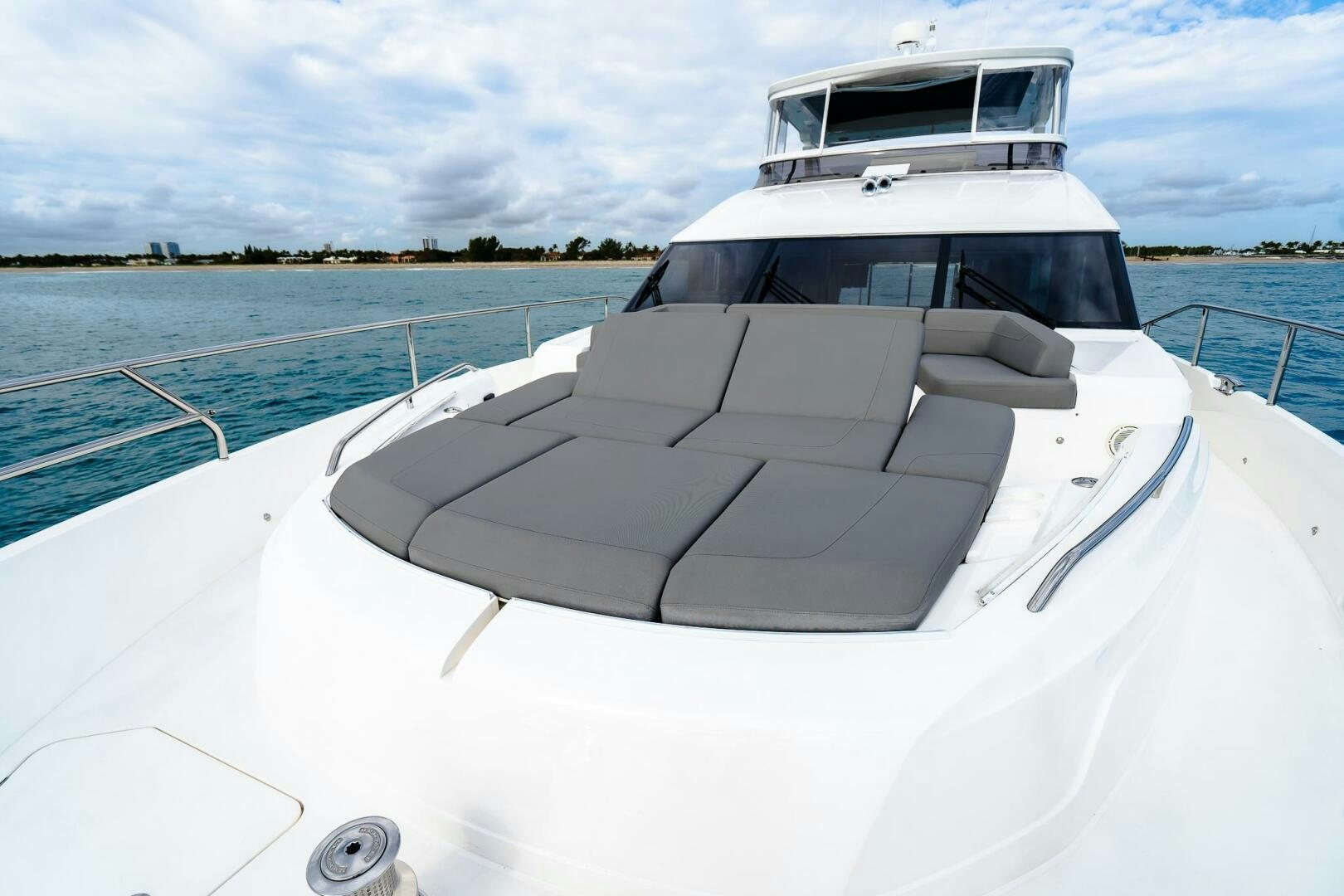 a white boat on a body of water aboard PERFECT MATCH Yacht for Sale