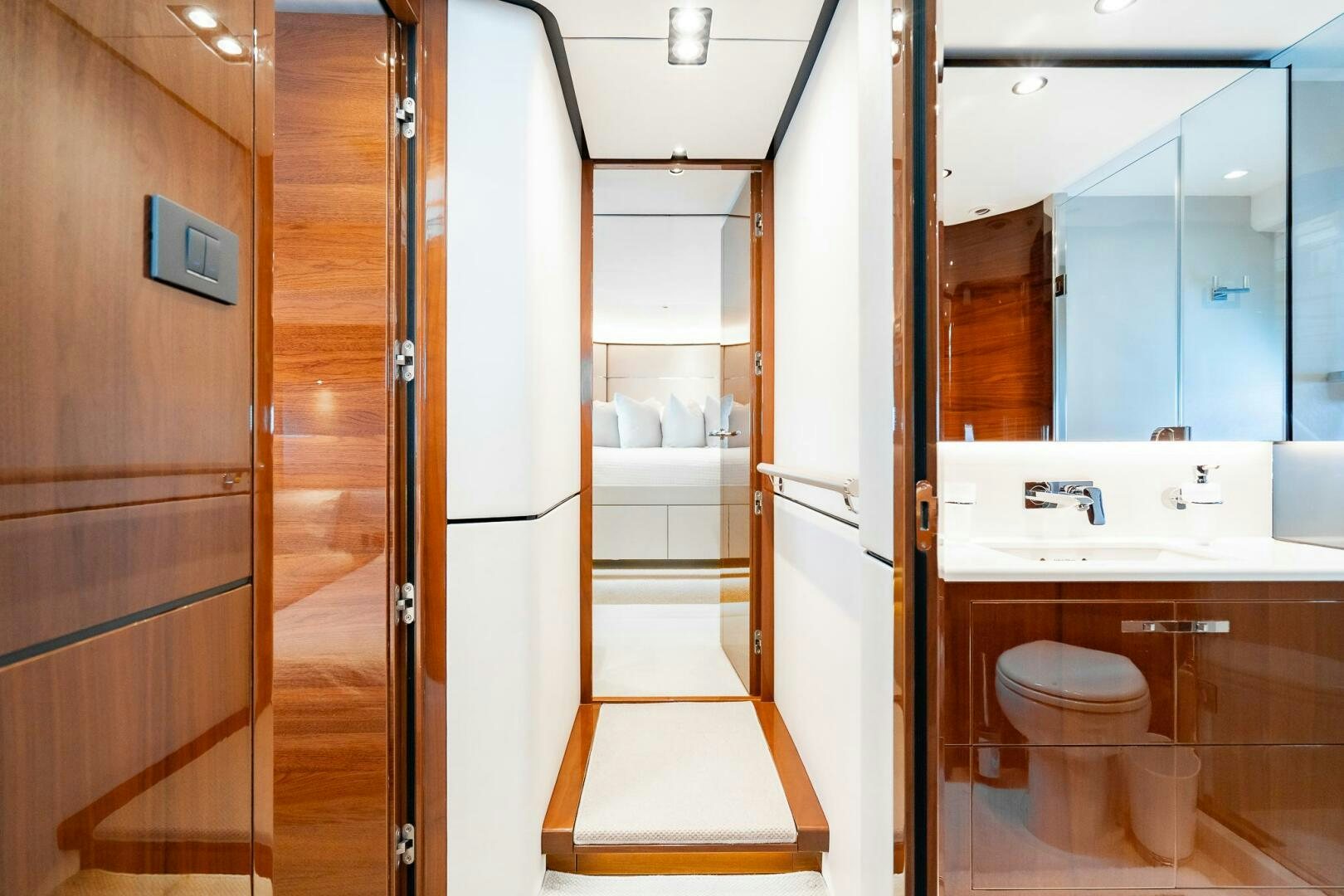 a bathroom with a toilet and a sink aboard PERFECT MATCH Yacht for Sale