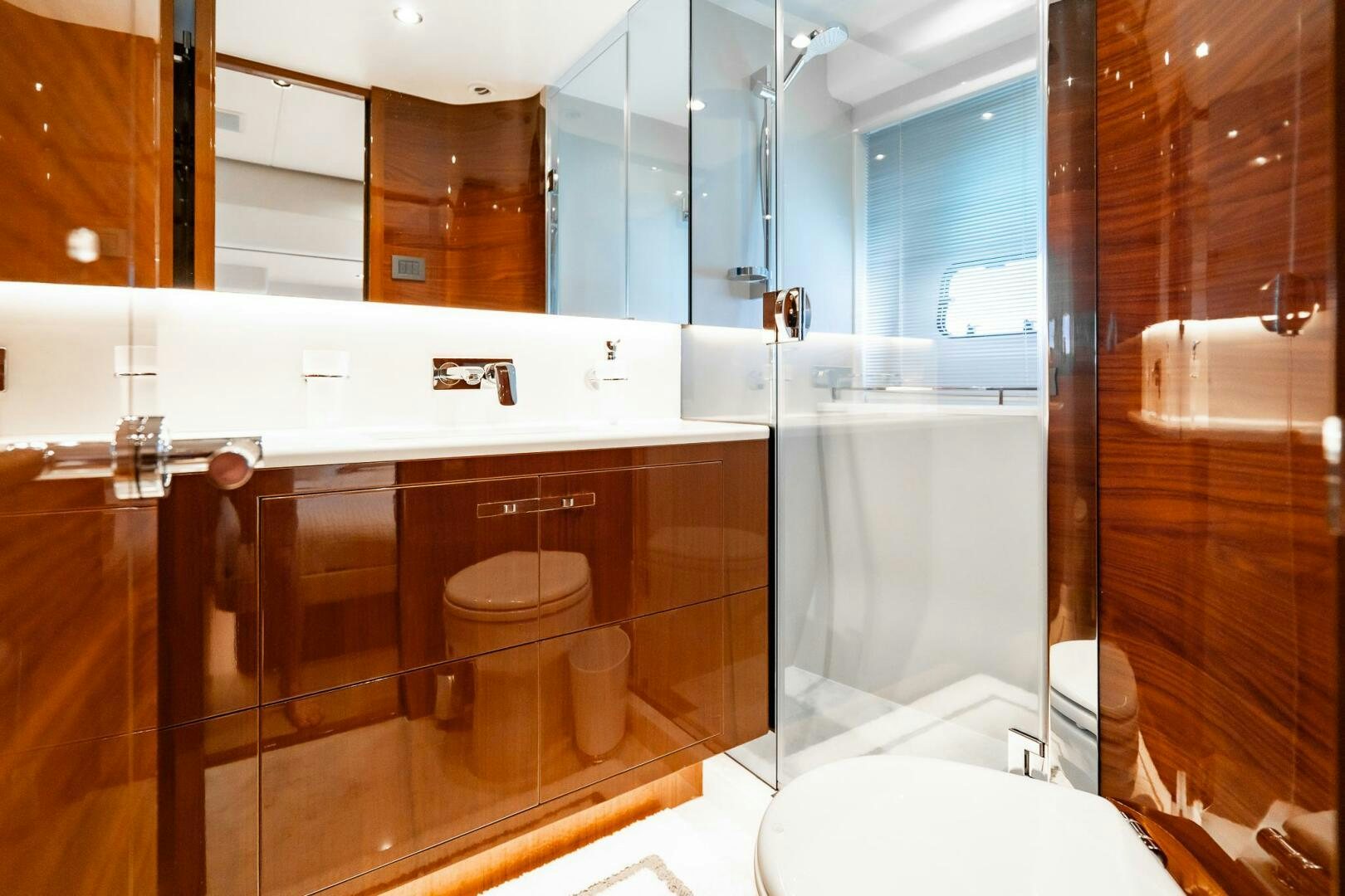 a bathroom with a glass shower aboard PERFECT MATCH Yacht for Sale