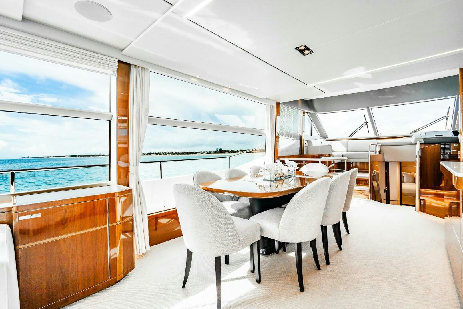 a room with a table and chairs aboard PERFECT MATCH Yacht for Sale
