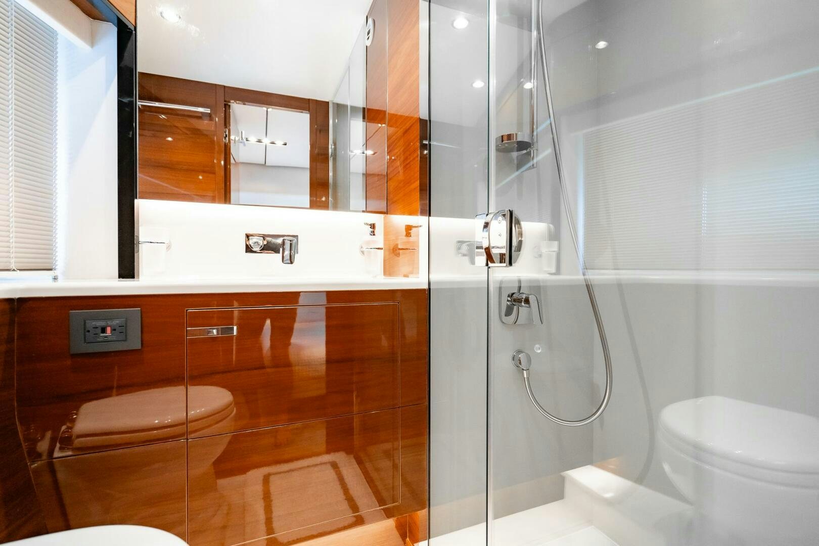 a bathroom with a glass shower aboard PERFECT MATCH Yacht for Sale