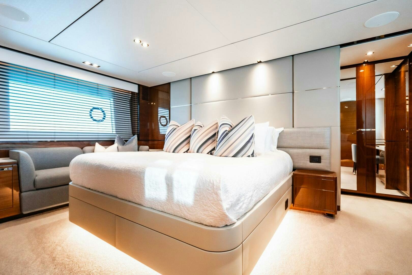 a room with a couch and a bed aboard PERFECT MATCH Yacht for Sale
