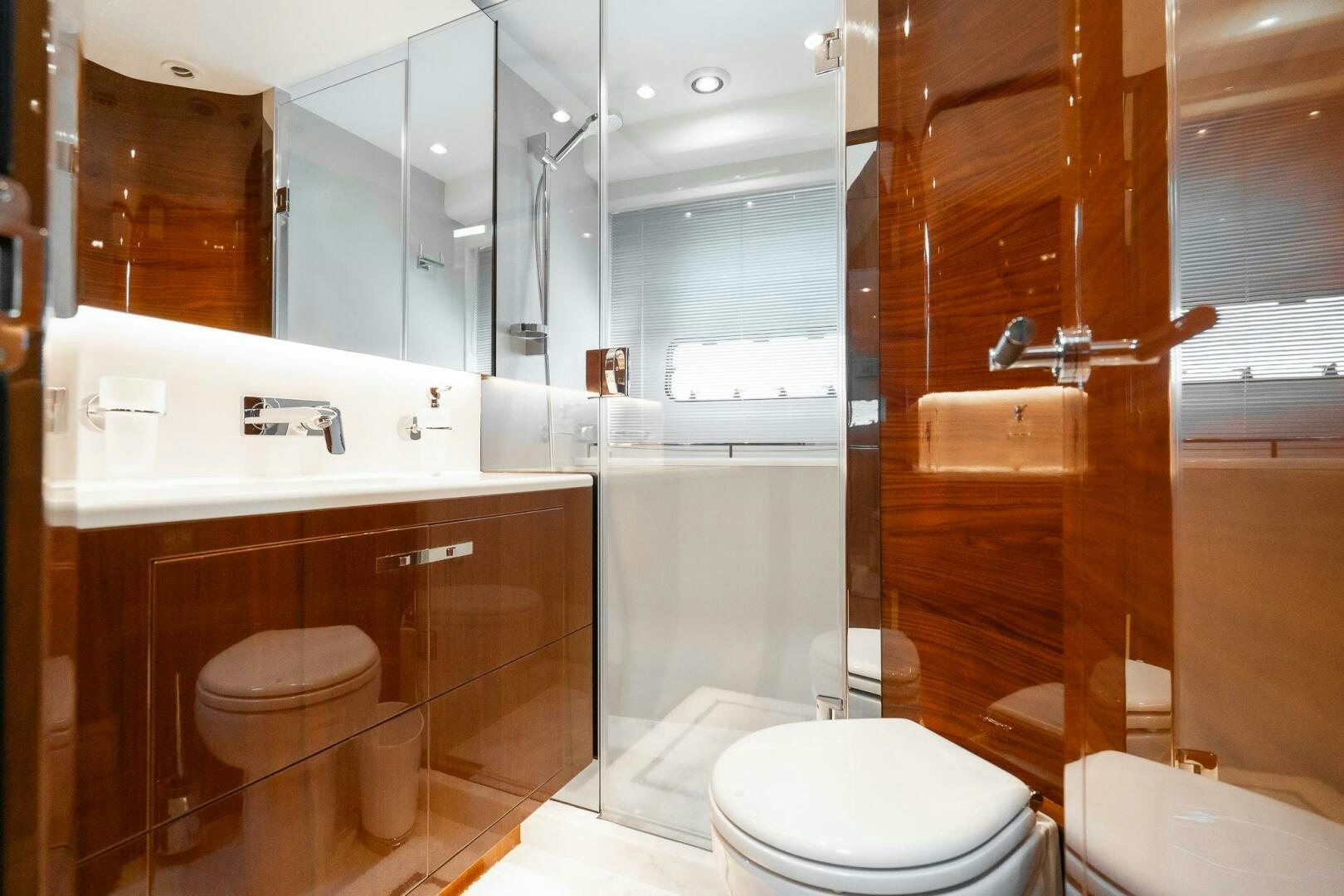 a bathroom with a glass shower aboard PERFECT MATCH Yacht for Sale