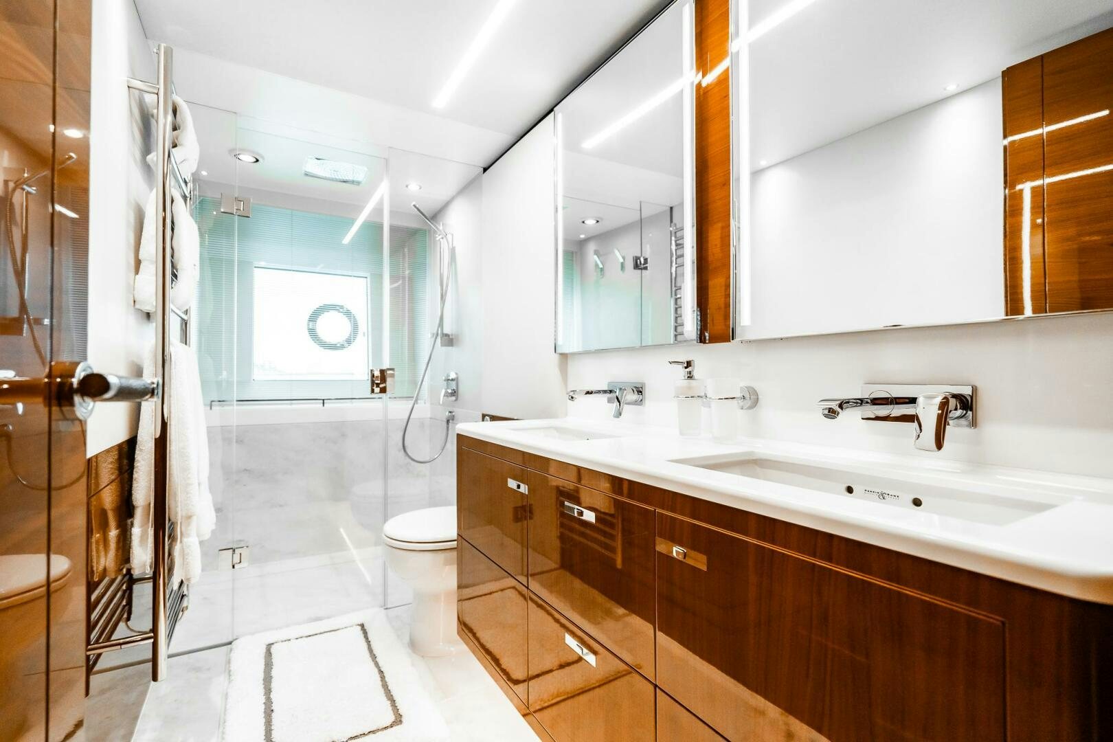 a bathroom with a sink and a toilet aboard PERFECT MATCH Yacht for Sale