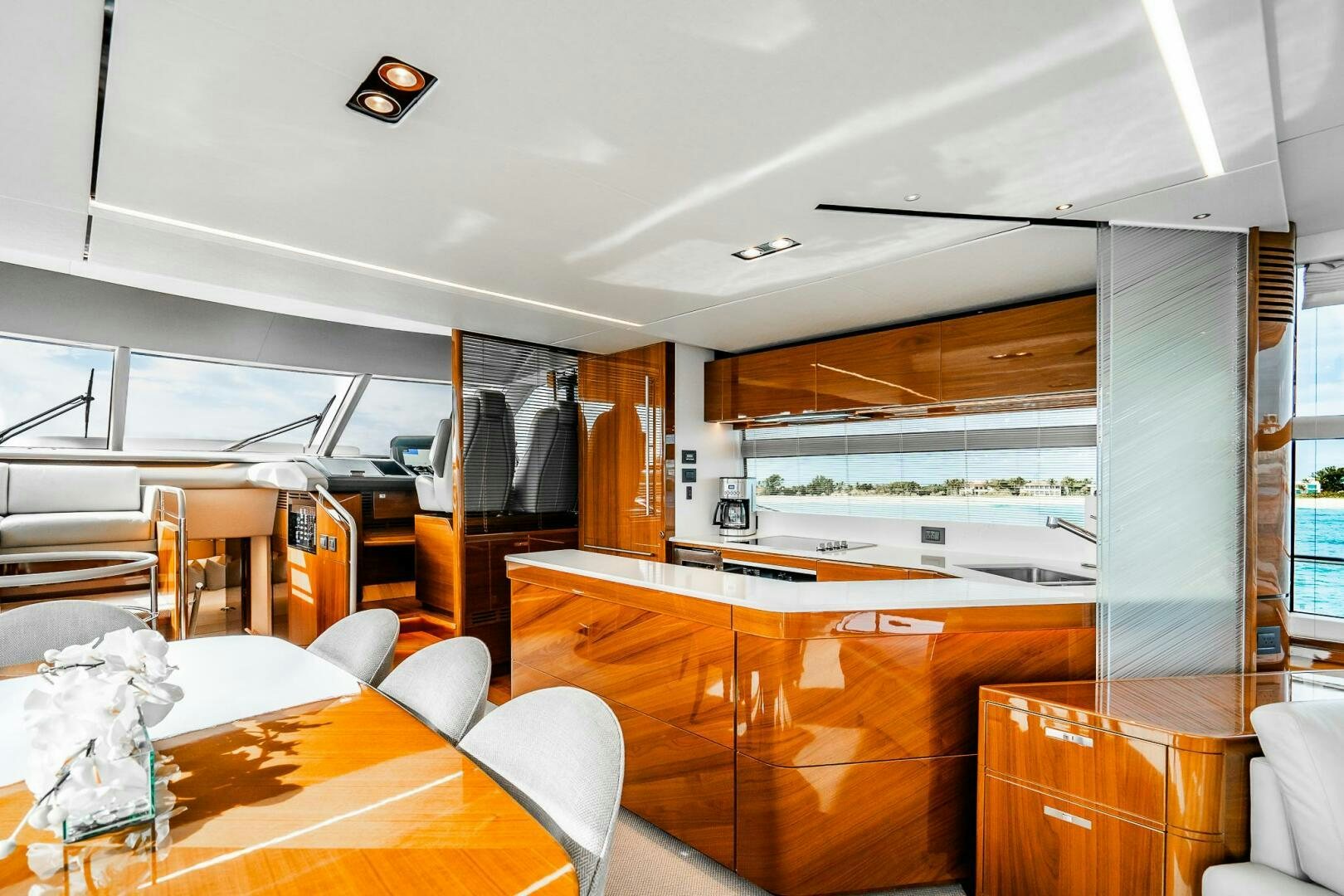 a room with a table and chairs aboard PERFECT MATCH Yacht for Sale
