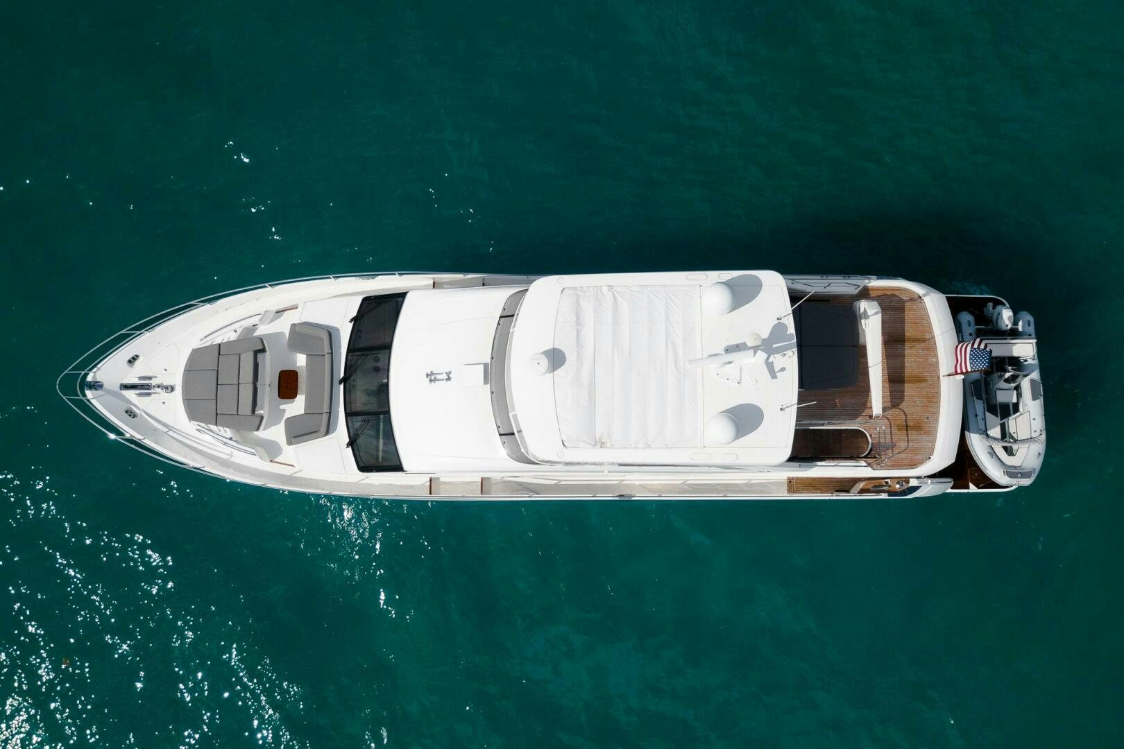 a white boat in the water aboard PERFECT MATCH Yacht for Sale