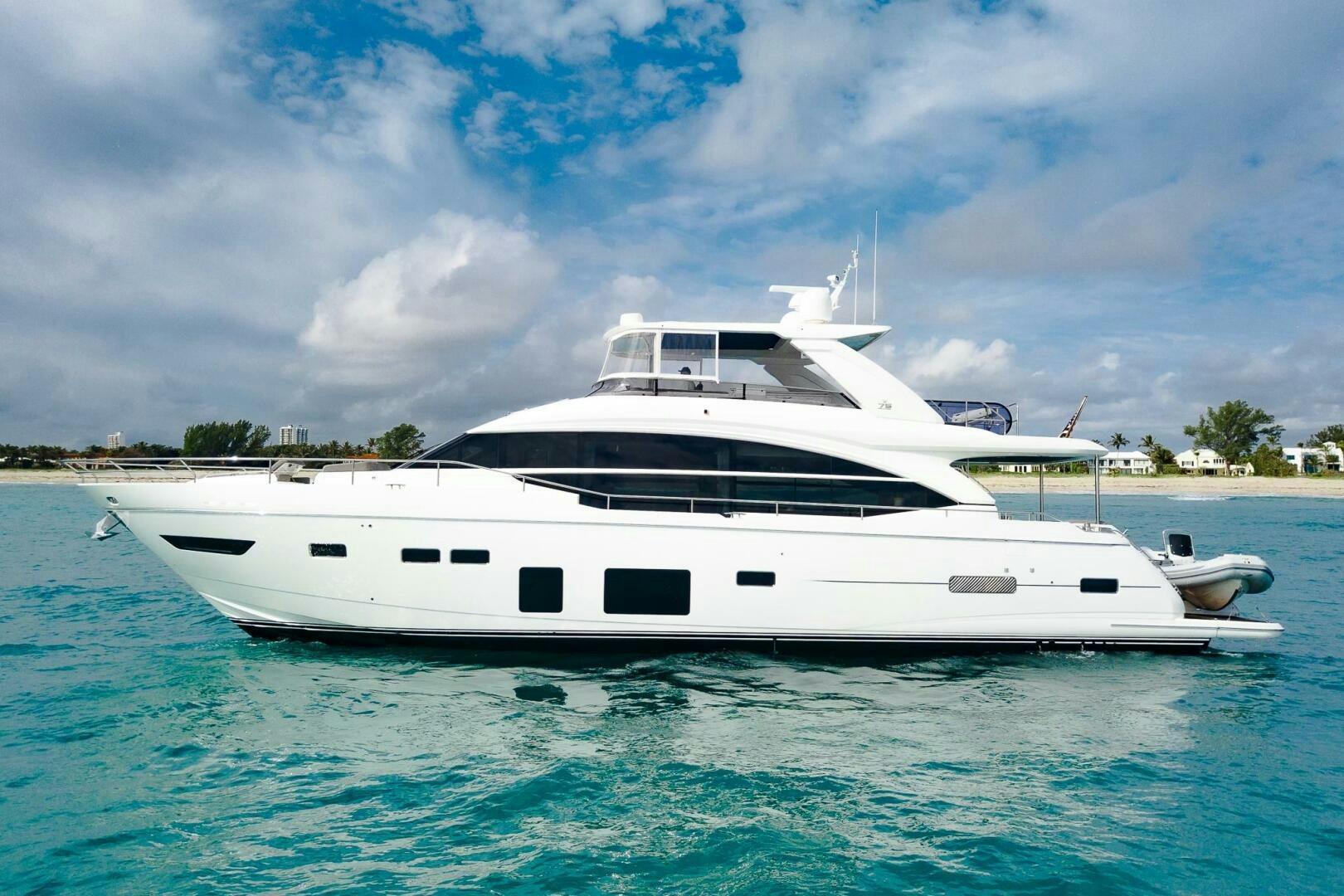 a white yacht in the water aboard PERFECT MATCH Yacht for Sale