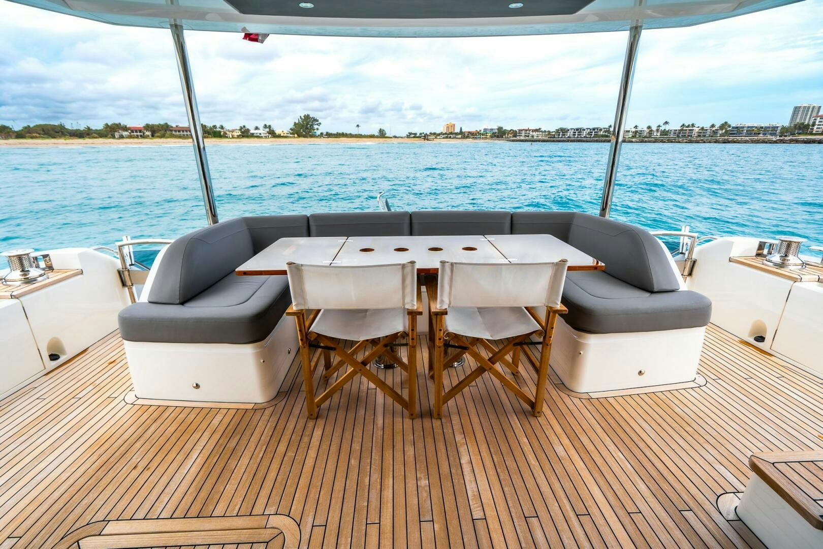 a table and chairs on a deck aboard PERFECT MATCH Yacht for Sale
