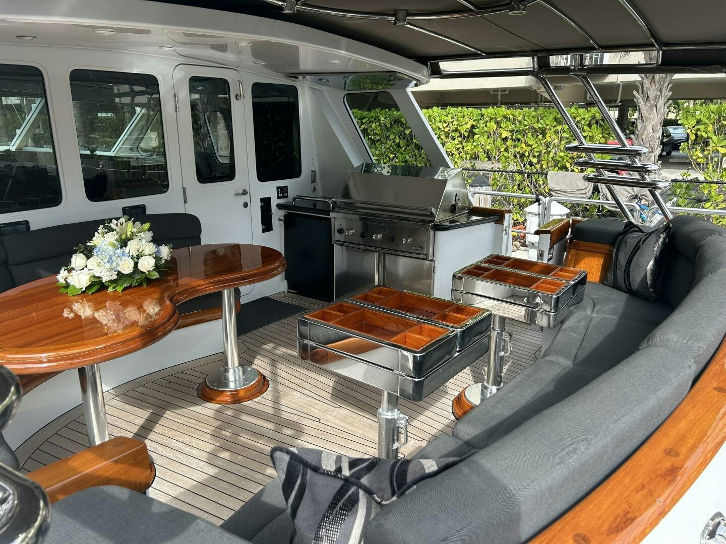 a room with a couch and a table and chairs aboard TOTO Yacht for Sale