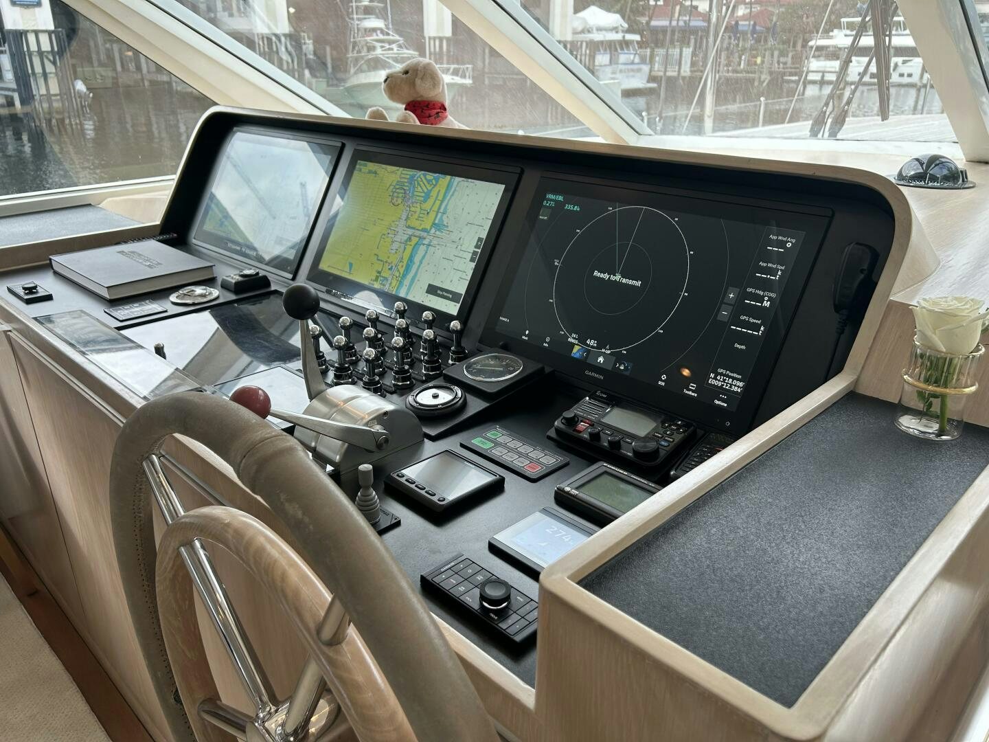 a desk with computers and monitors aboard TOTO Yacht for Sale